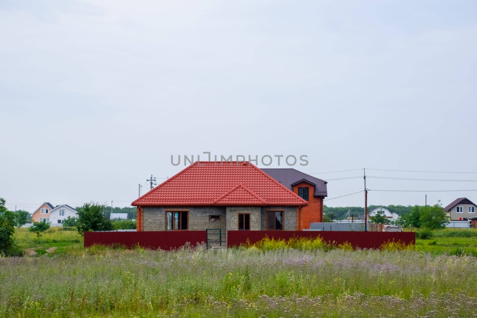 A cottage village of two-storey houses. Low-rise development.