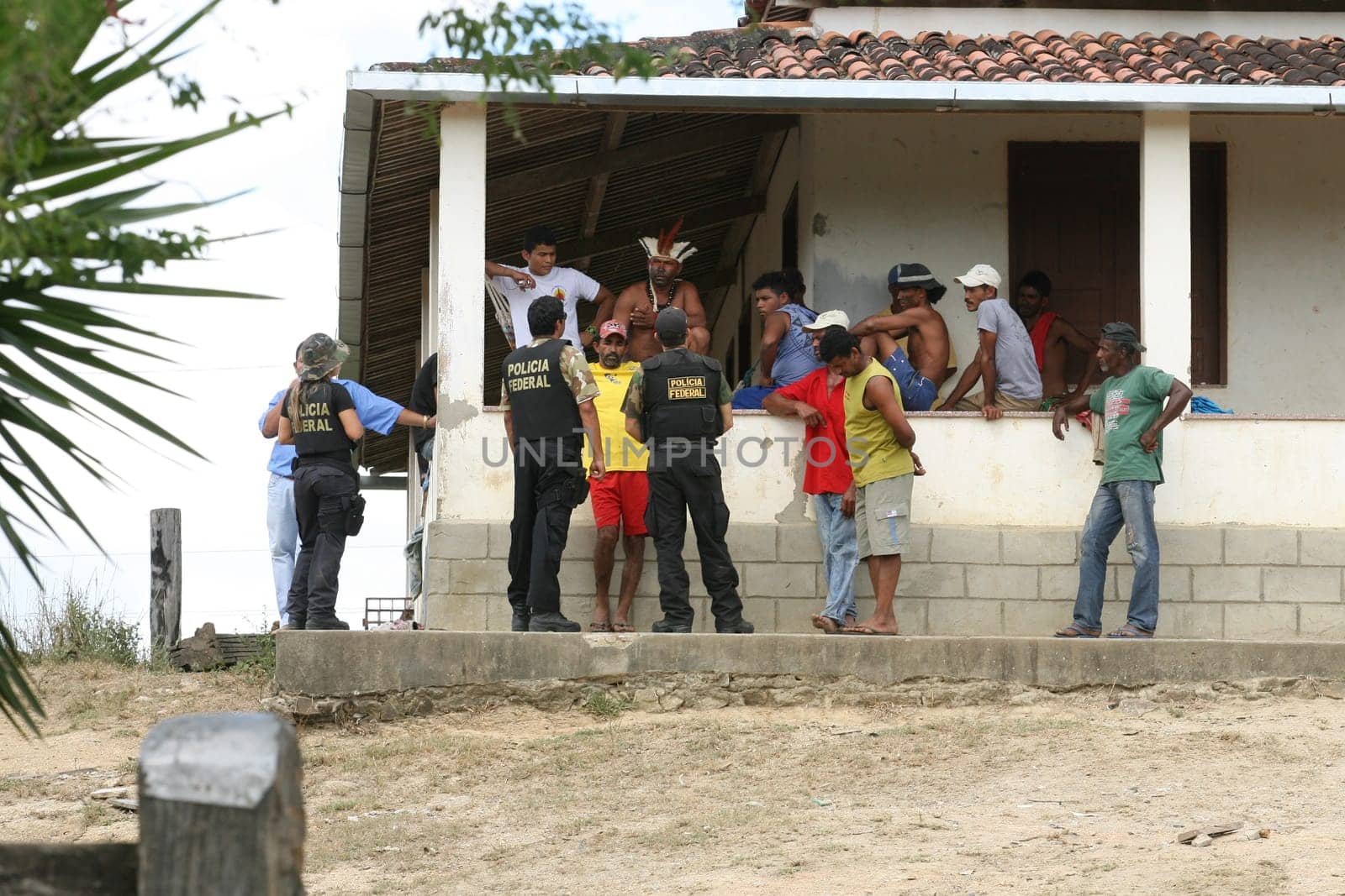 pau brasil , bahia / brazil  - april 16, 2012: Federal Police officers accompany a farm invaded by Pataxo Hahahae Indians in rural Pau Brazil.