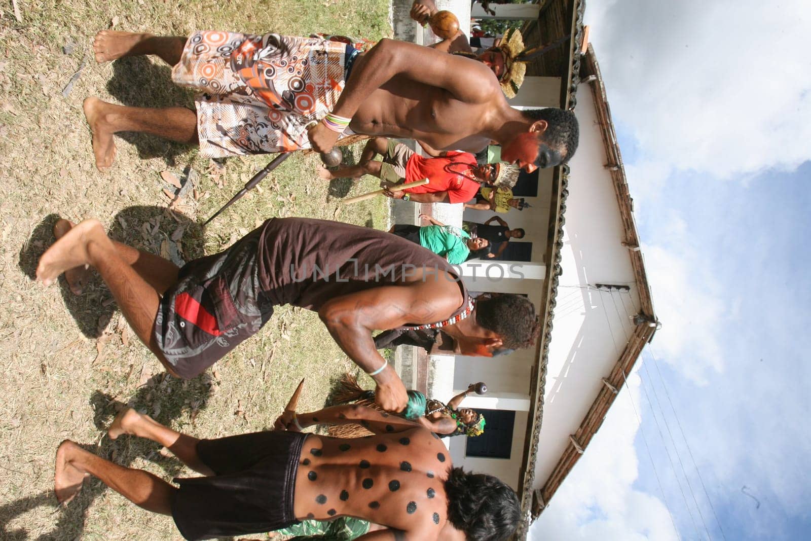pau brasil , bahia / brazil - april 16, 2012: Pataxo Hahahae indigenous people dance after breaking into a farm in the rural area of Pau Brazil.