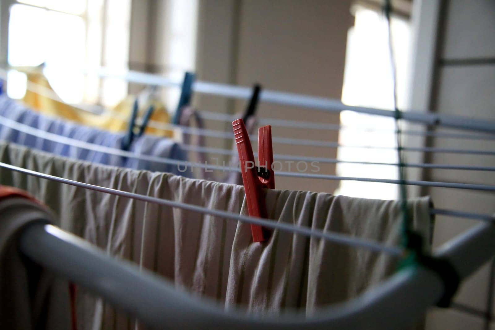 salvador, bahia / brazil - may 7, 2020: clothespins are seen in clothesline in an apartment in the city of Salvador.