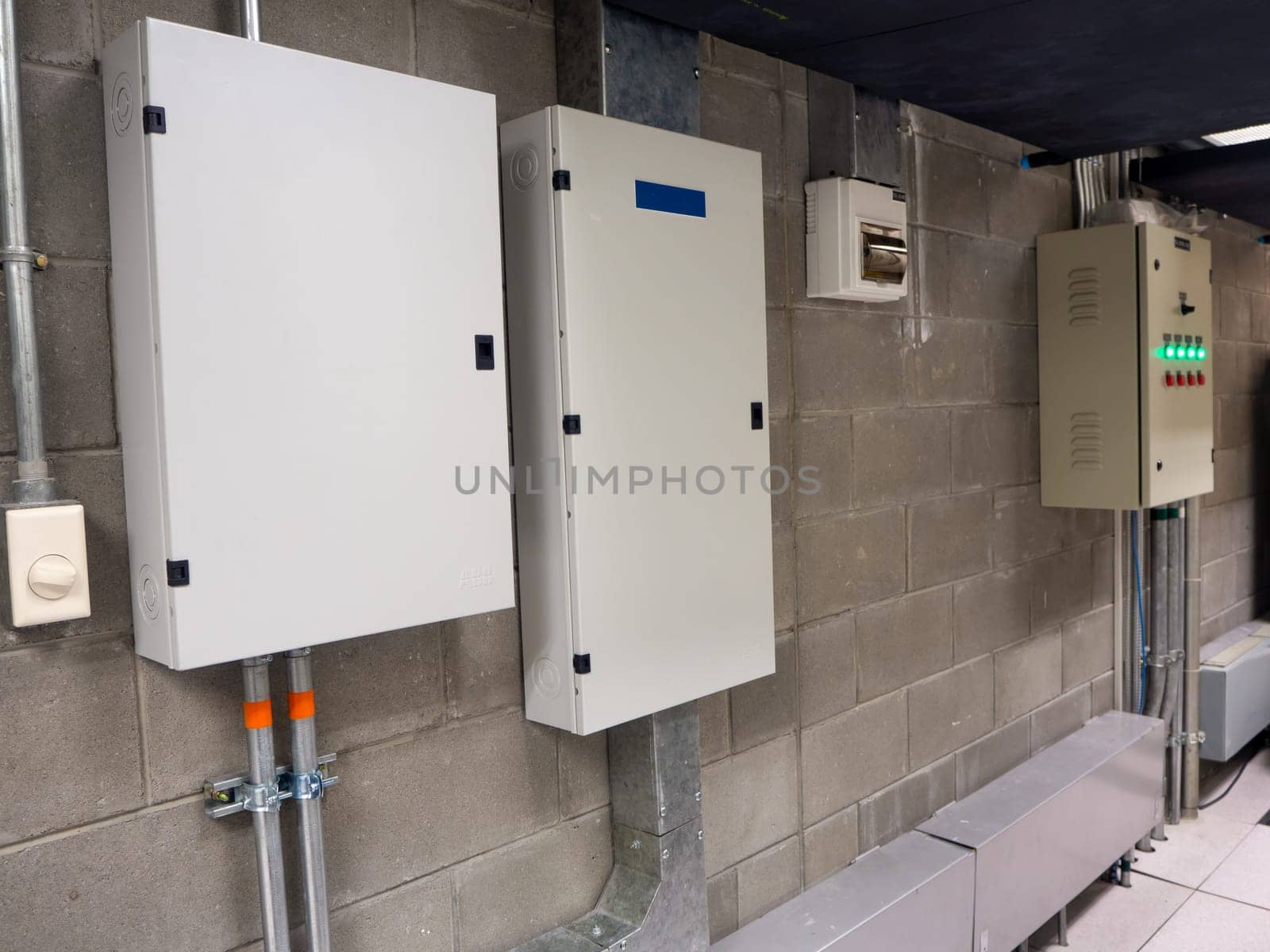 Electric control panel cabinets with the many color buttons for controller the electrical system circuit is installed