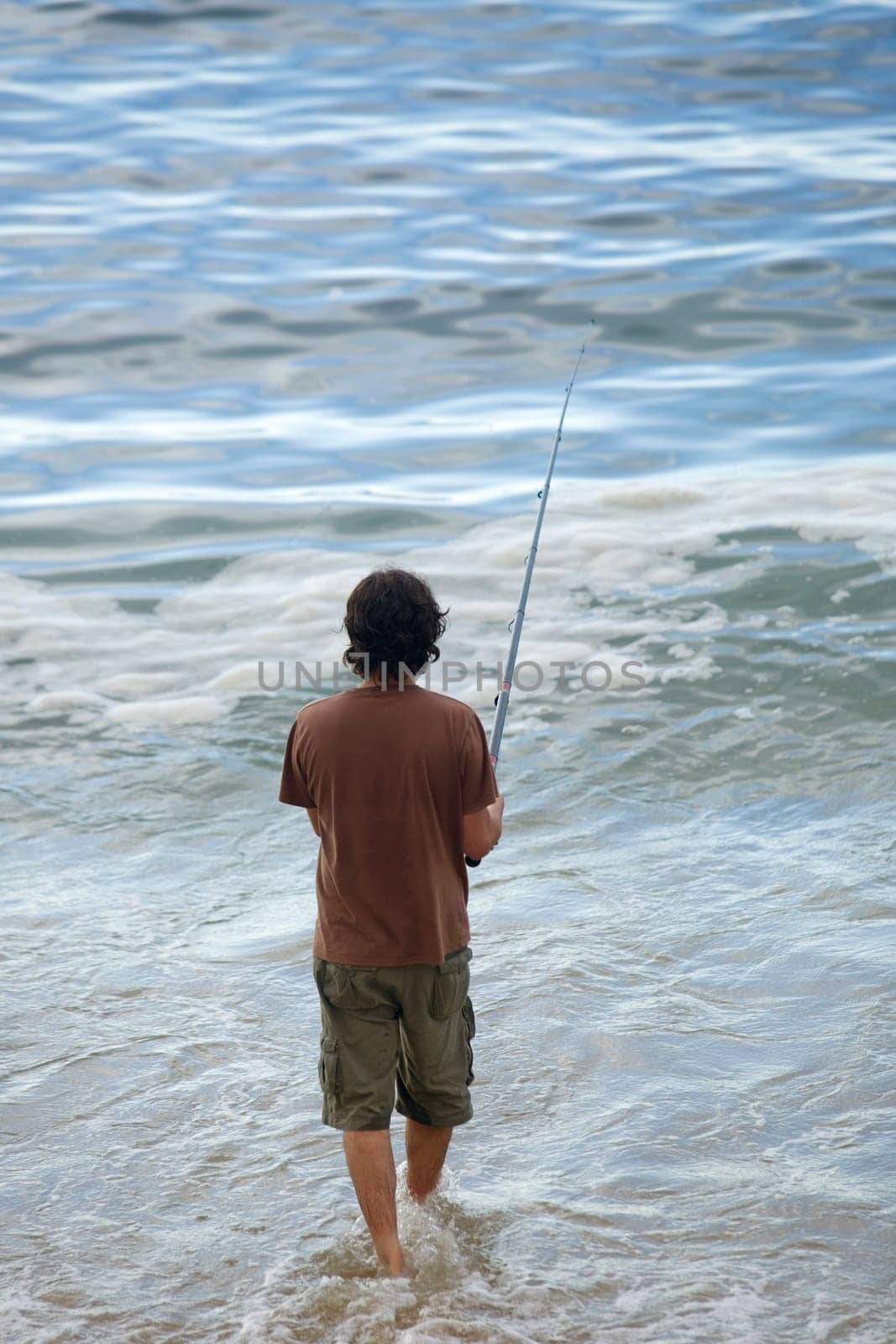 fisherman at the sea, in the north of spain