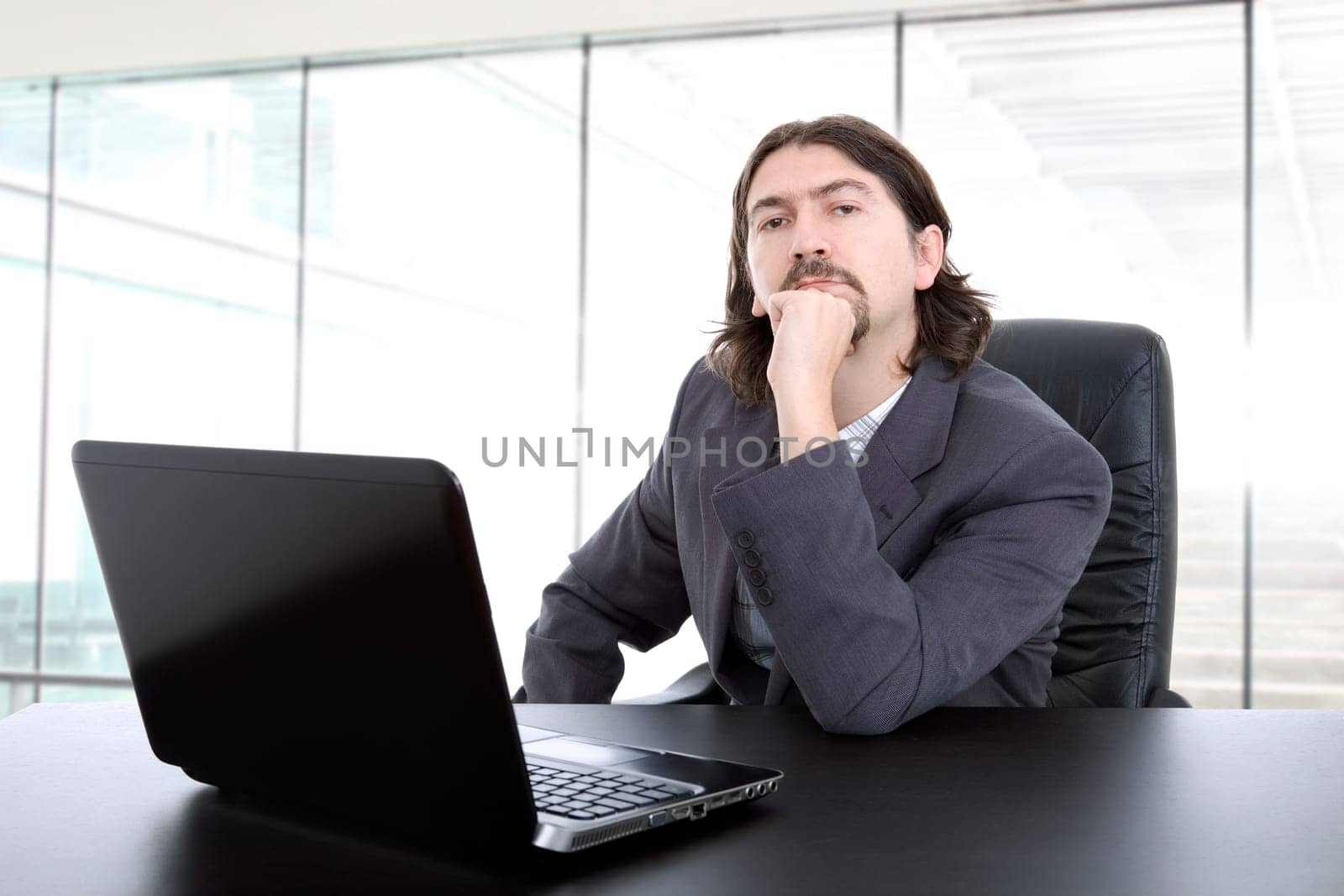 young business man working with is laptop at the office