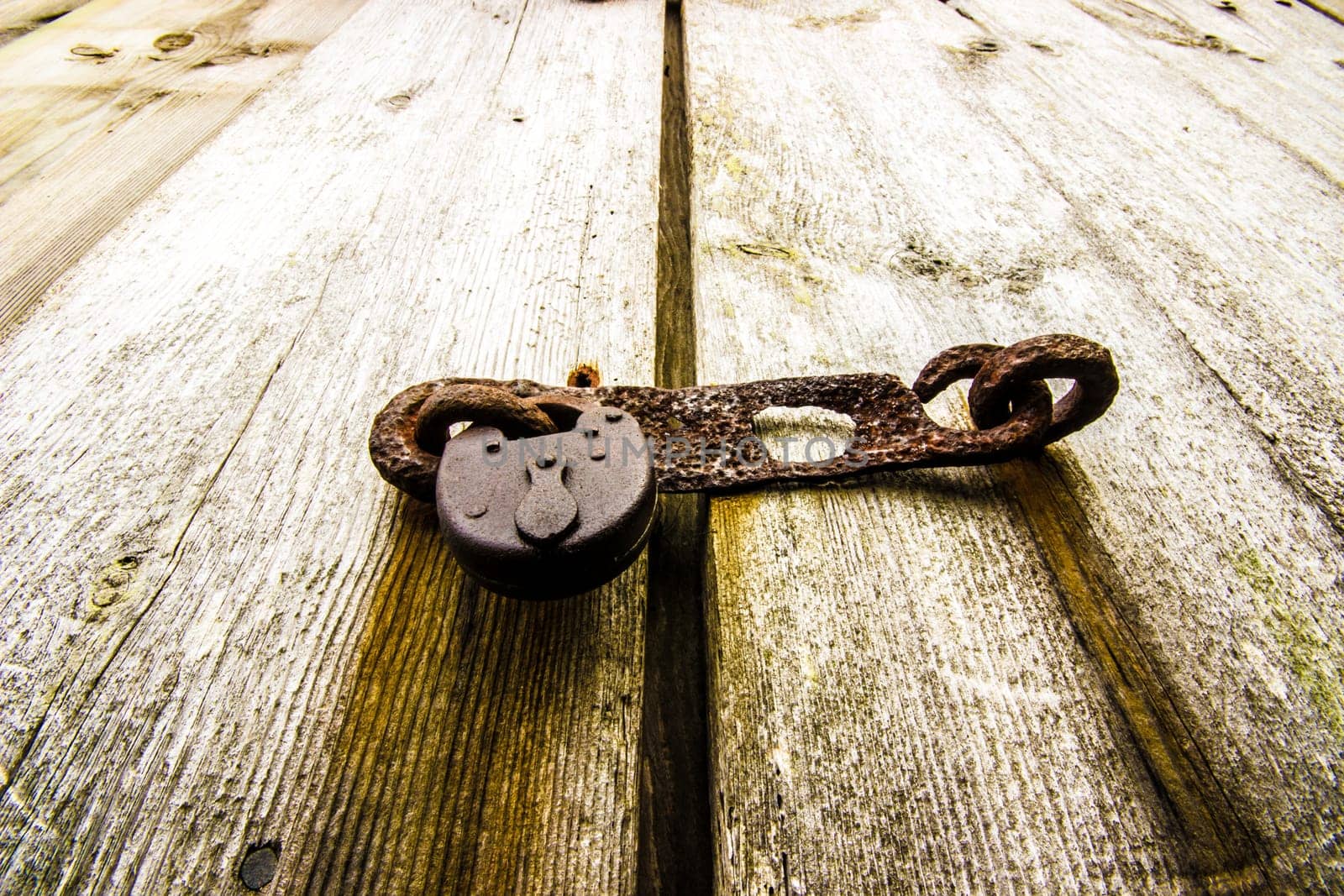Rusty Old Padlock on Door