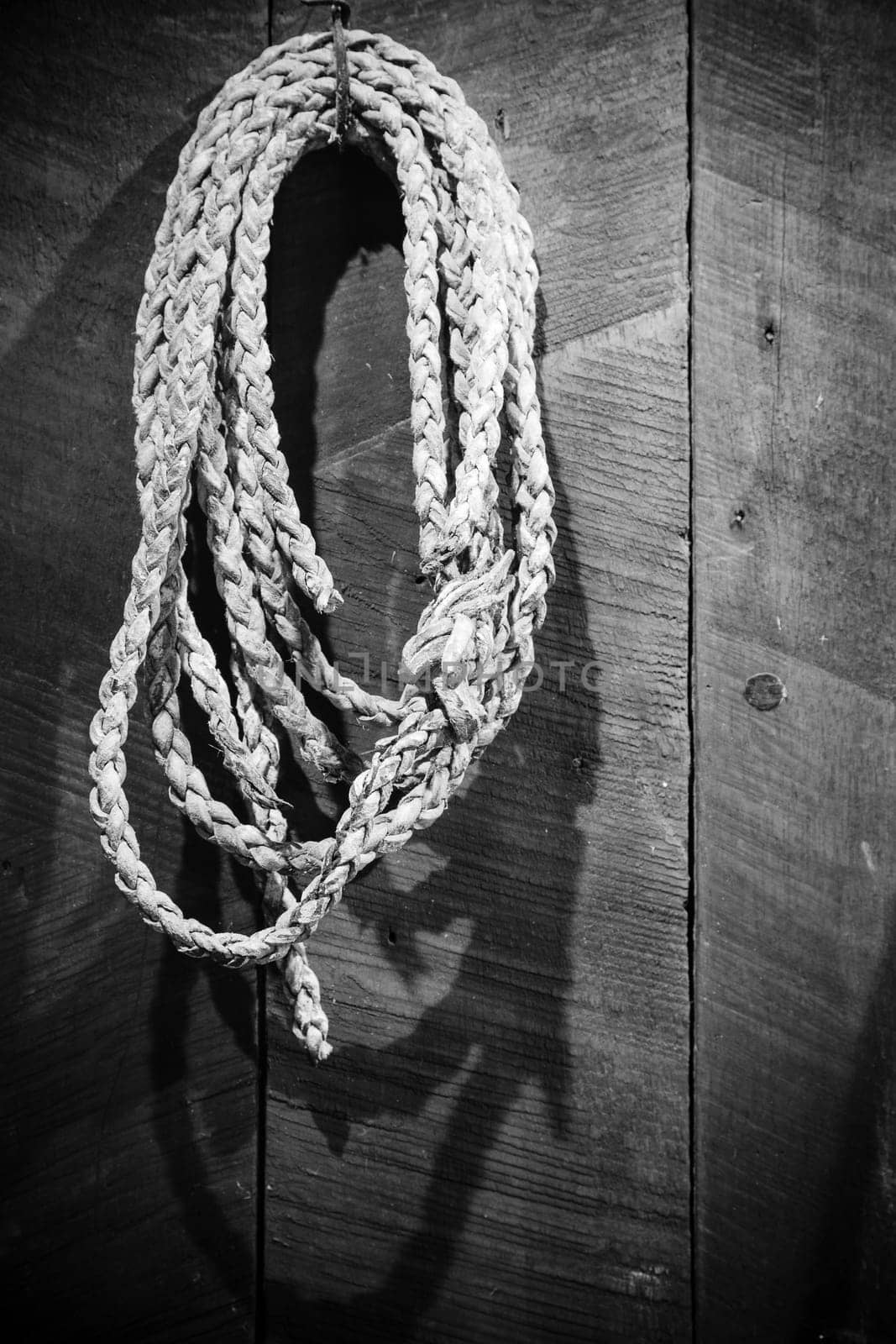Retro style image of an old cowboy lasso at La Casona historic site in Costa Rica