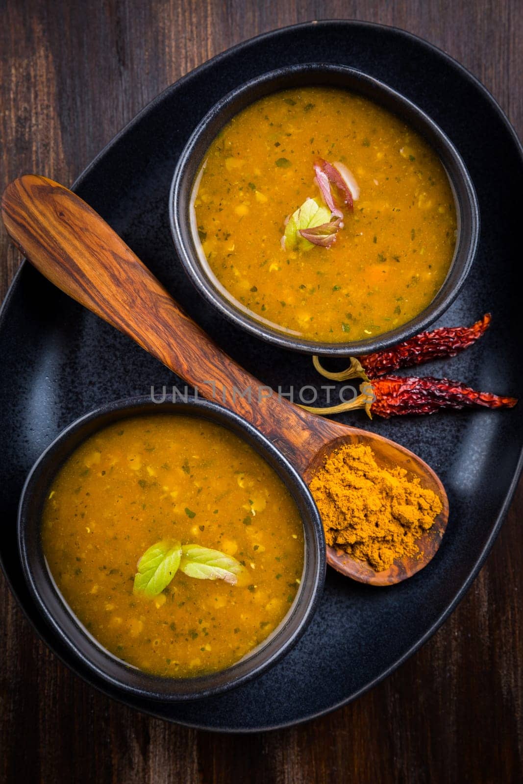 Red lentil curry soup with hot chilli and Thai basil