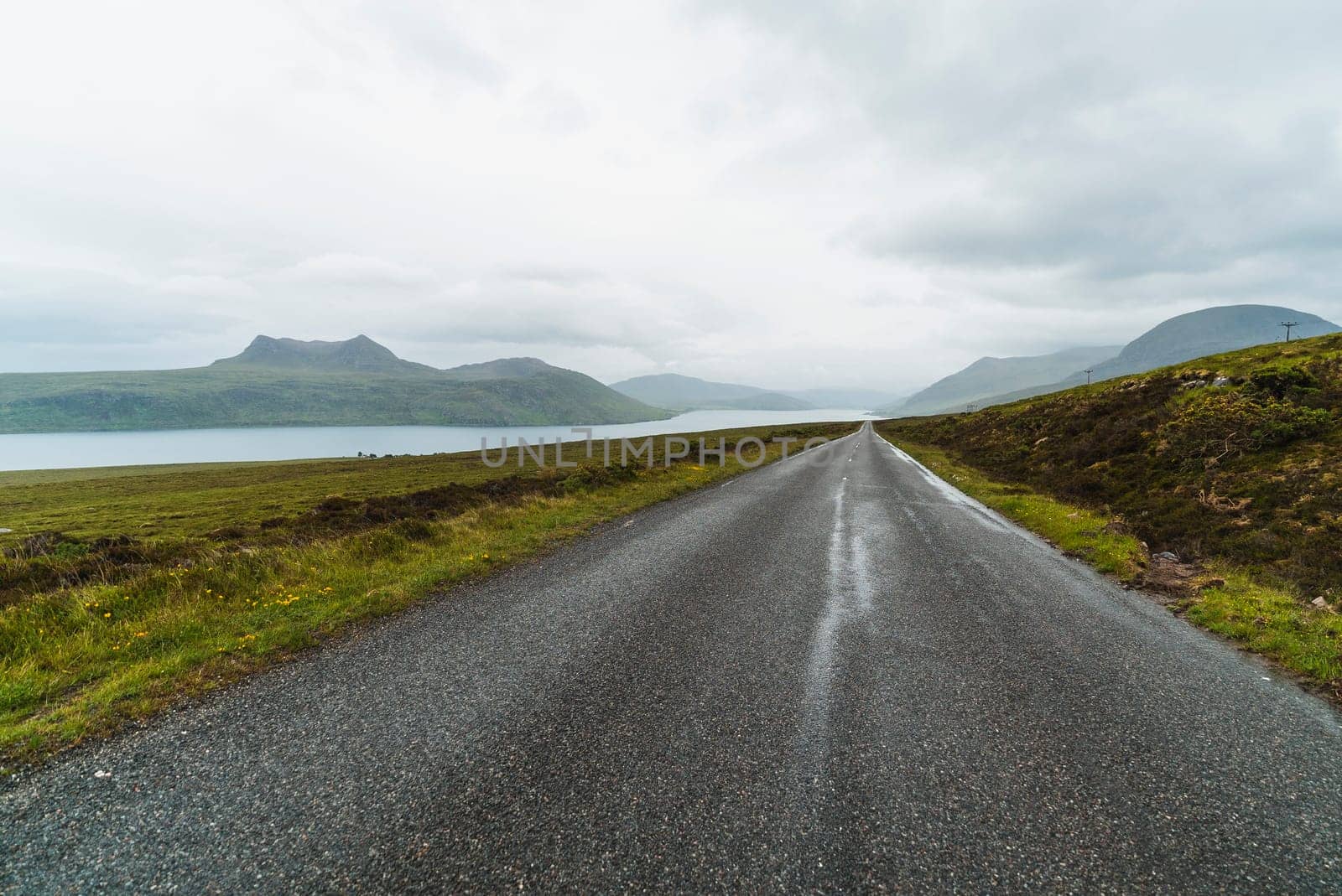 Landscape of mountains and a road in Scotland
