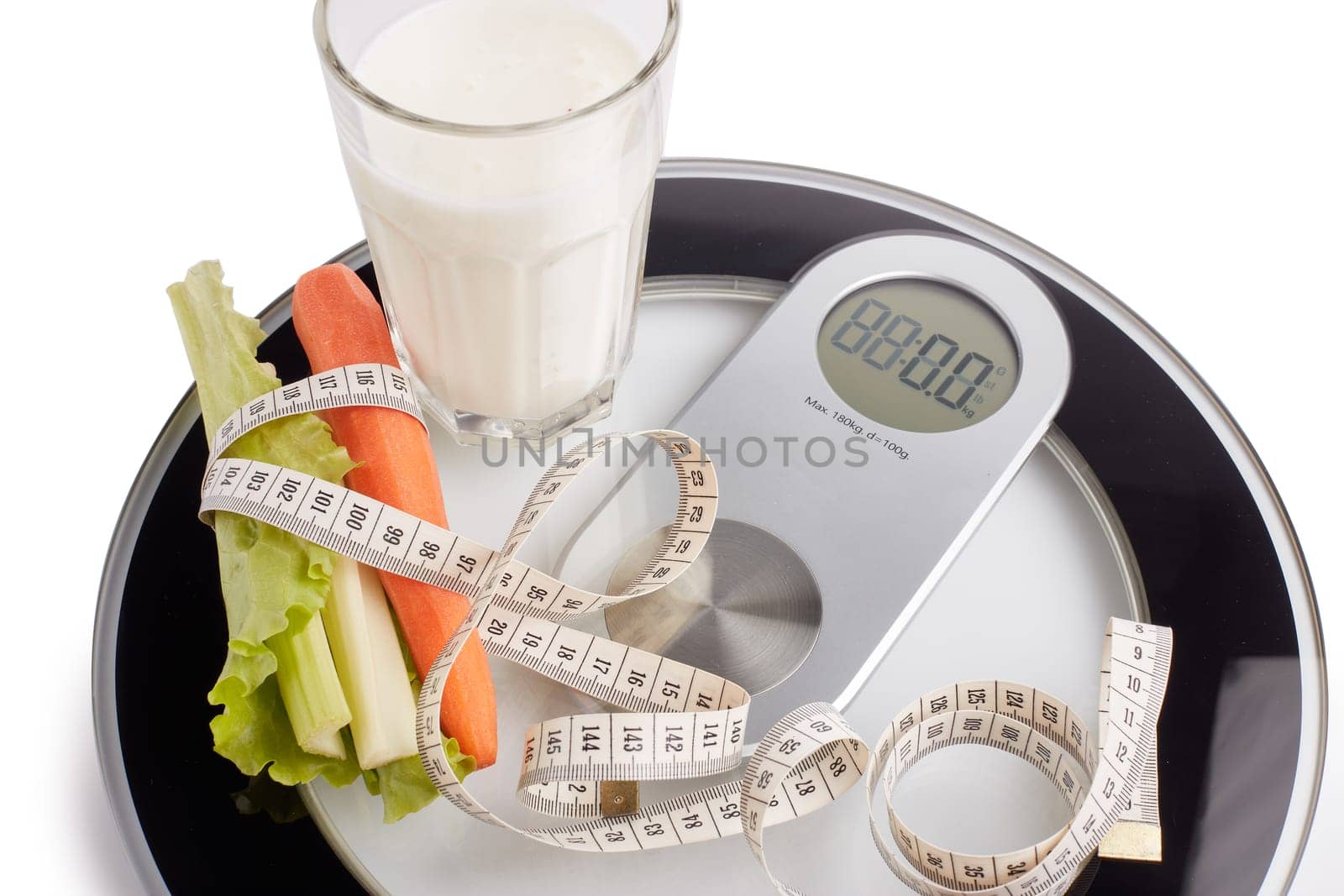 Slimming, diet, and control of weight. Still life with healthy food, scales and measuring tape. Healthy nutrition. Healthy lifestyle concept. Control of weight during the isolation period