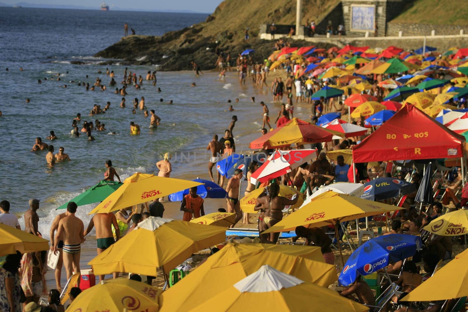 salvador, bahia / brazil - april 22, 2014: People are seen at Porto da Barra beach in Salvador city.