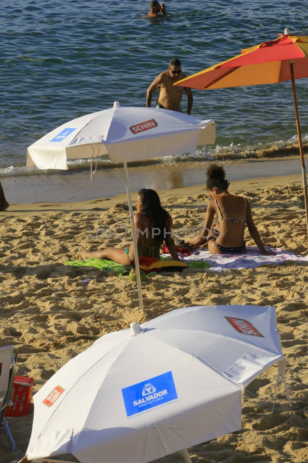 salvador, bahia / brazil - april 22, 2014: People are seen at Porto da Barra beach in Salvador city.