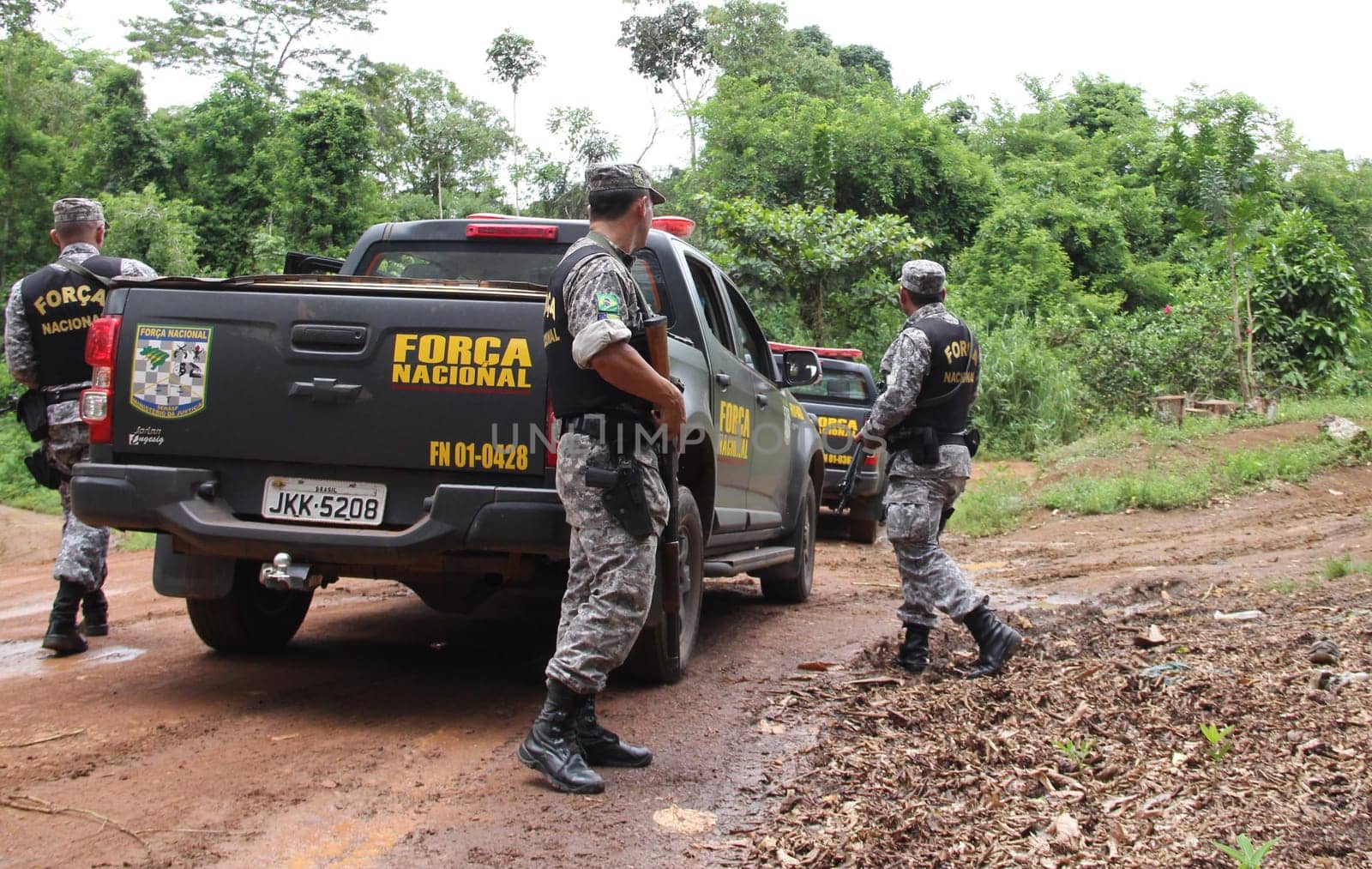 ilheus, bahia / brazil - february 15, 2014: National Force agents survey armed conflict area between farmers and Tupinamba Indians in rural Ilheus.