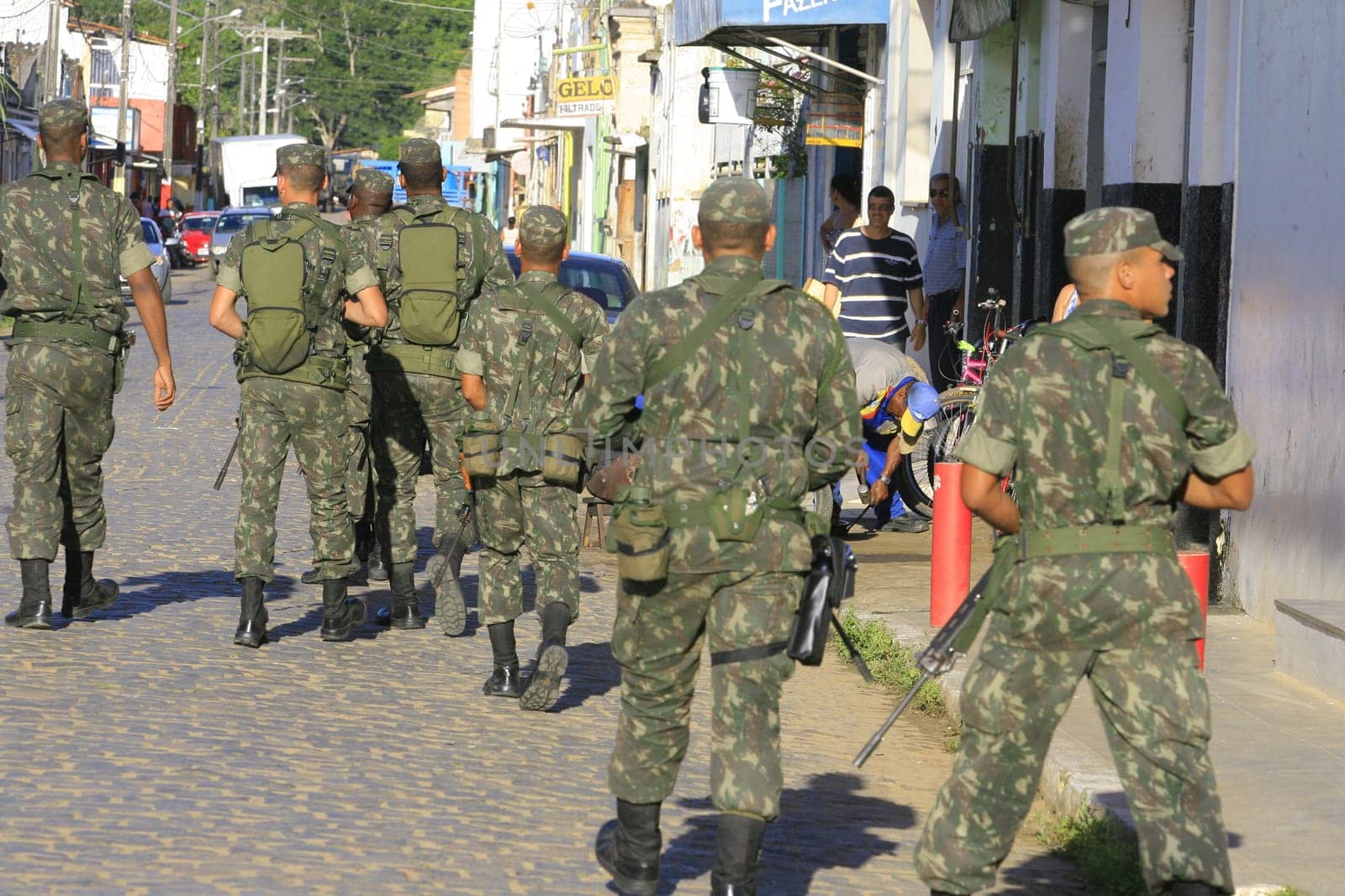 buerarema, bahia / brazil - february 14, 2014: Army soldiers patrol the streets of Buerarema City Center due to series of conflicts involving Tupinamba ethnic Indians and local farmers..