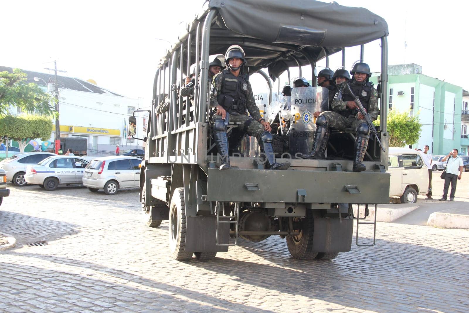 buerarema, bahia / brazil - february 14, 2014: Army soldiers patrol the streets of Buerarema City Center due to series of conflicts involving Tupinamba ethnic Indians and local farmers..