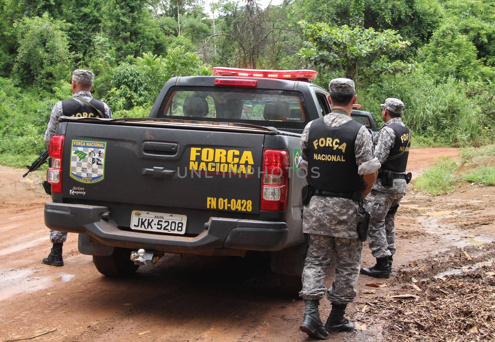 ilheus, bahia / brazil - february 15, 2014: National Force agents survey armed conflict area between farmers and Tupinamba Indians in rural Ilheus.