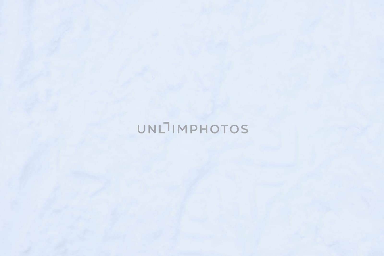 Snow boots track surface. Ski boot texture. Shoe sole traces background.