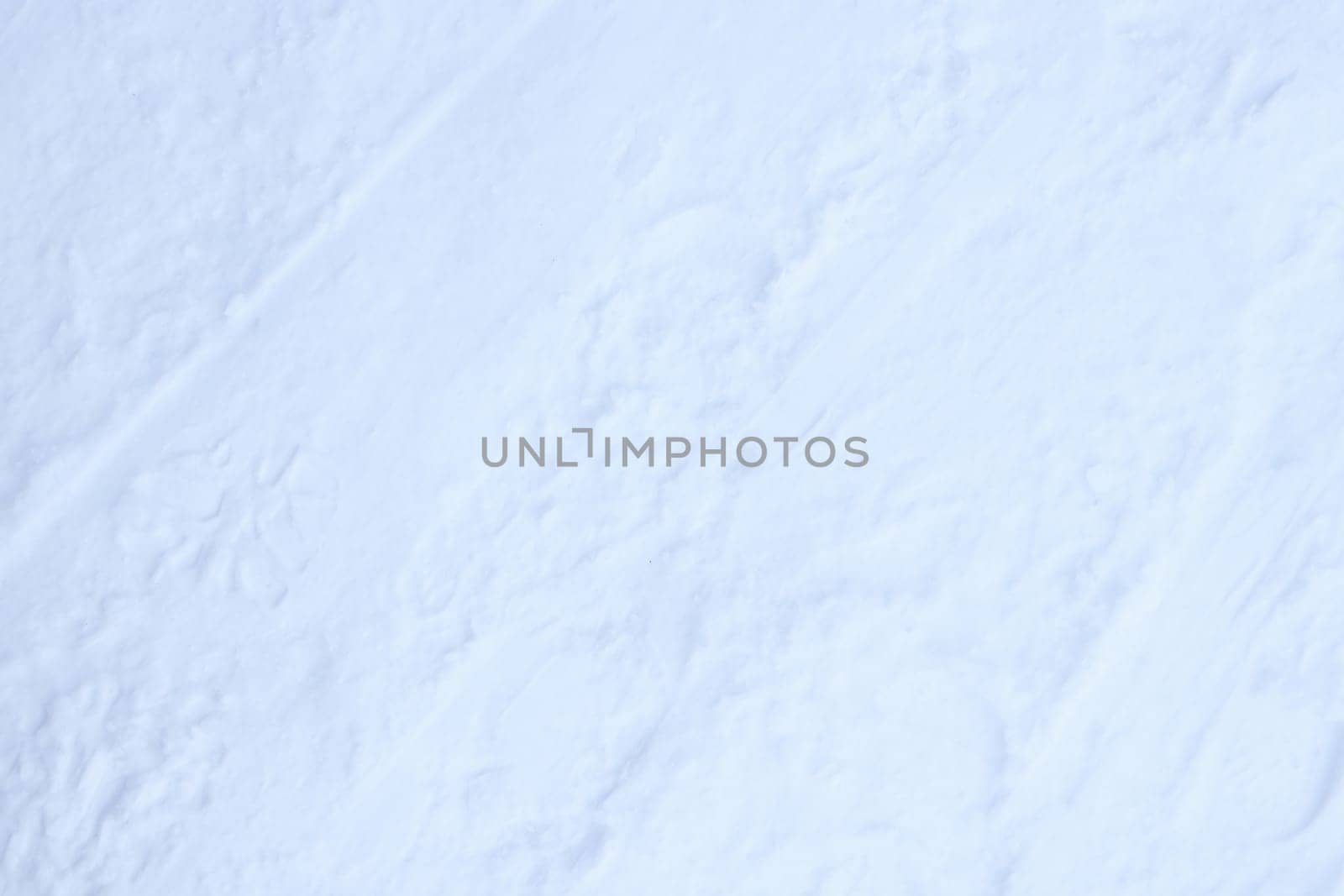 Ski trail texture. Ski run traces background. Snow skiing track surface.