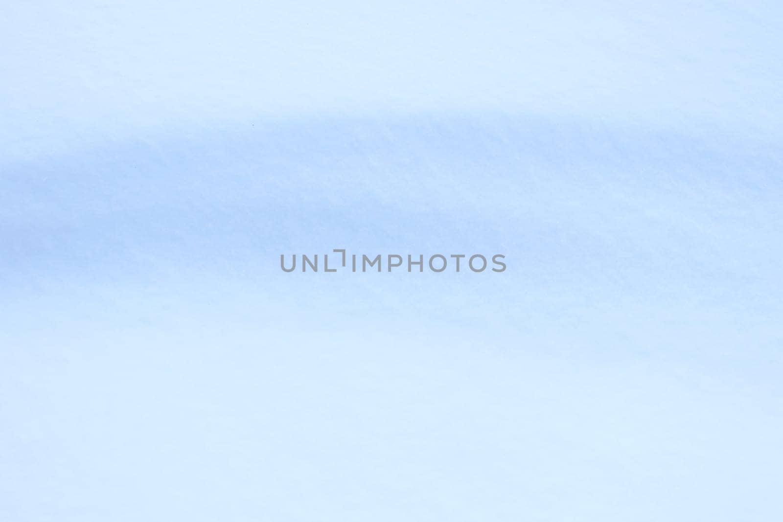 Winter snowdrift landscape background. Soft snow hills surface. Snowy mound texture.