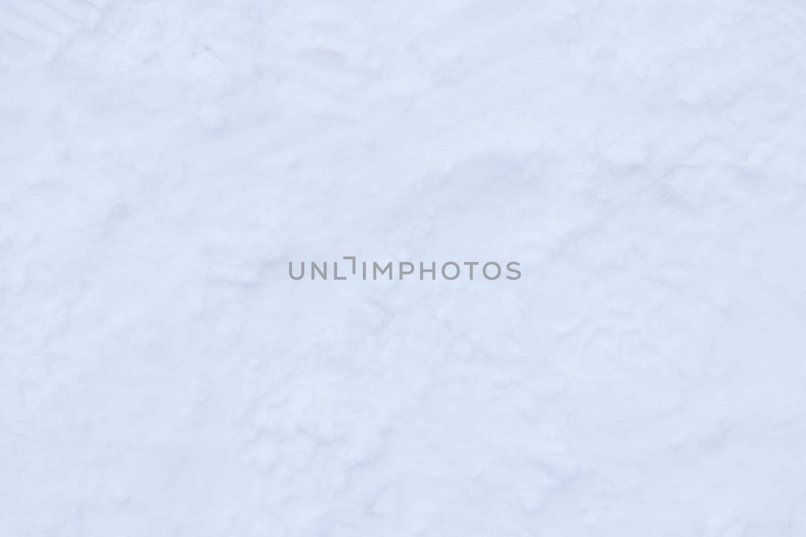 Snow boots track surface. Ski boot texture. Shoe sole traces background.