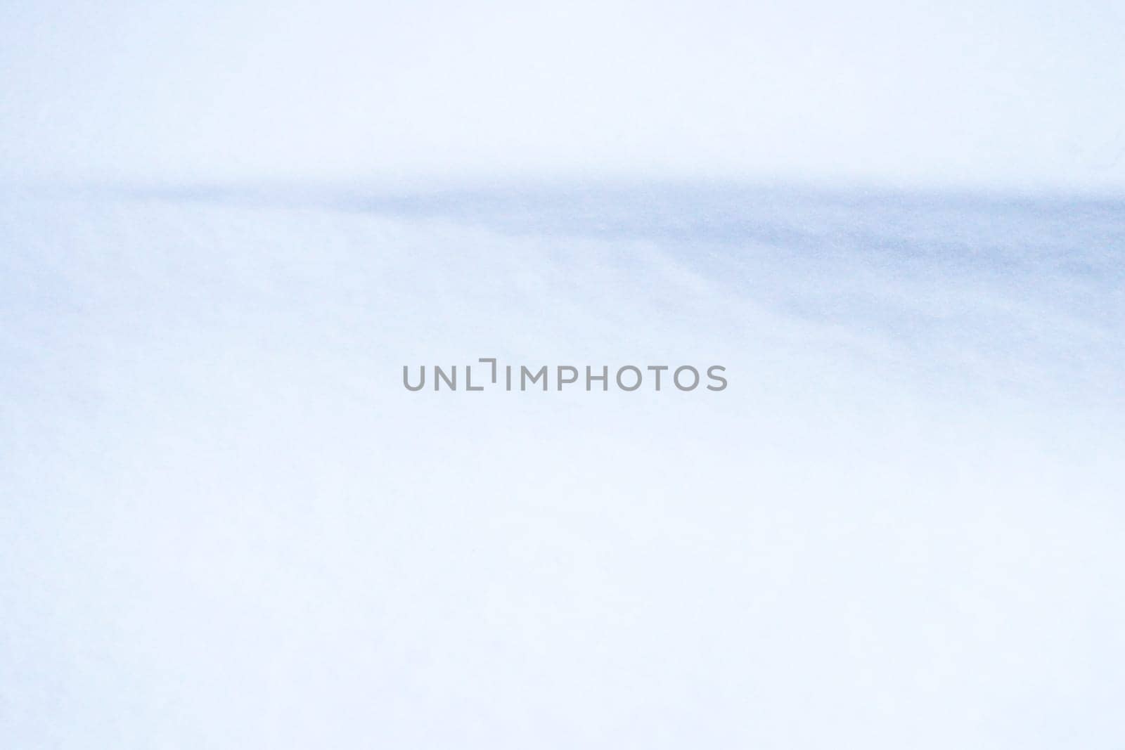 Snowy wind mound background. Winter cold weather texture.