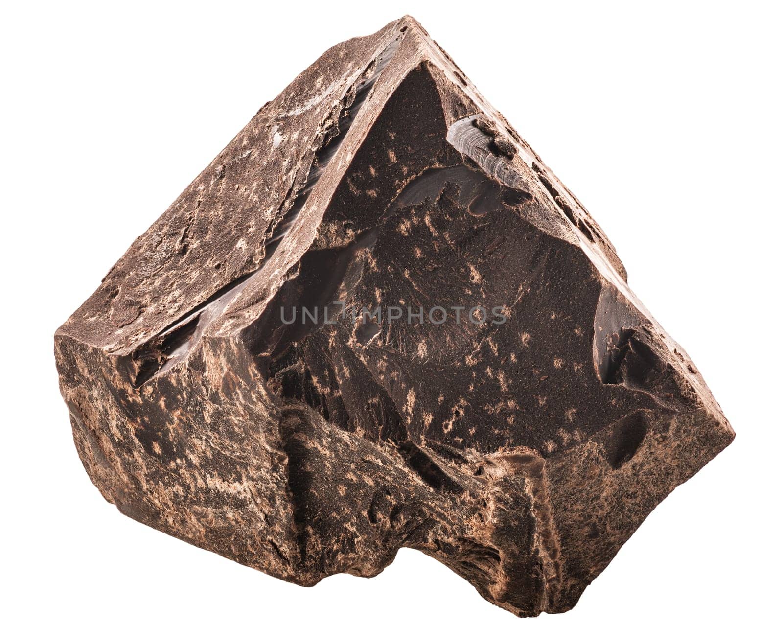 Chunk of roughly crushed chocolate or solid cocoa mass, isolated