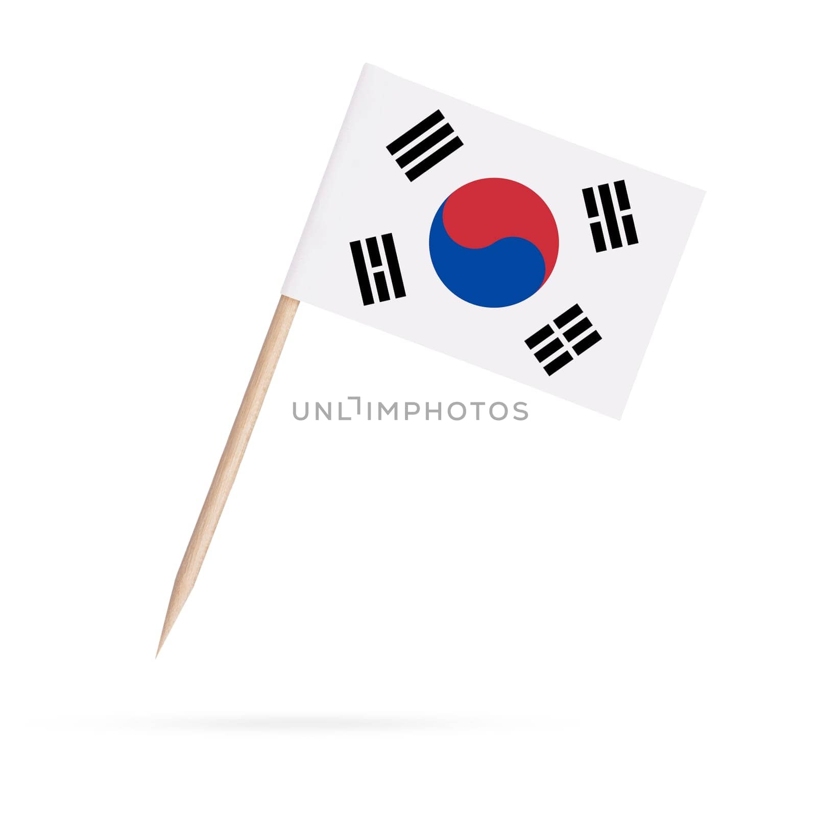 Miniature paper flag South-Korea. Isolated South Korean toothpick flag pointer on white background. With shadow below