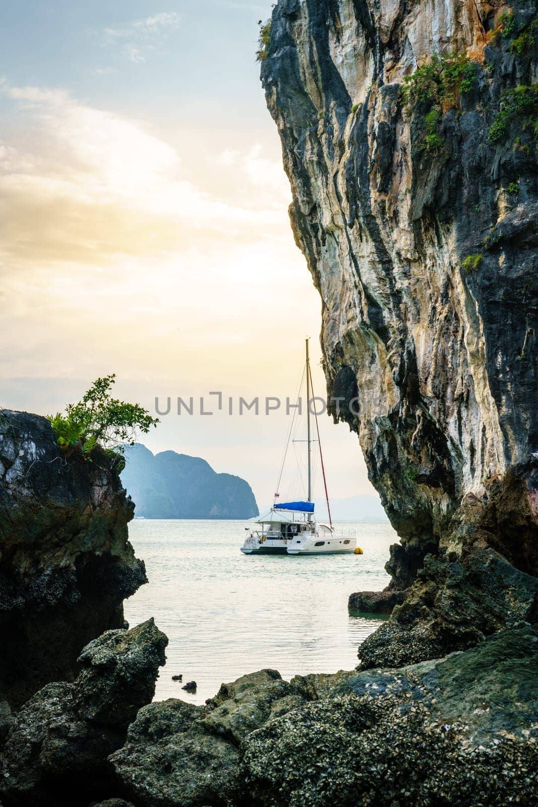 Sail boat anchored by Koh Hong island in Andaman Sea