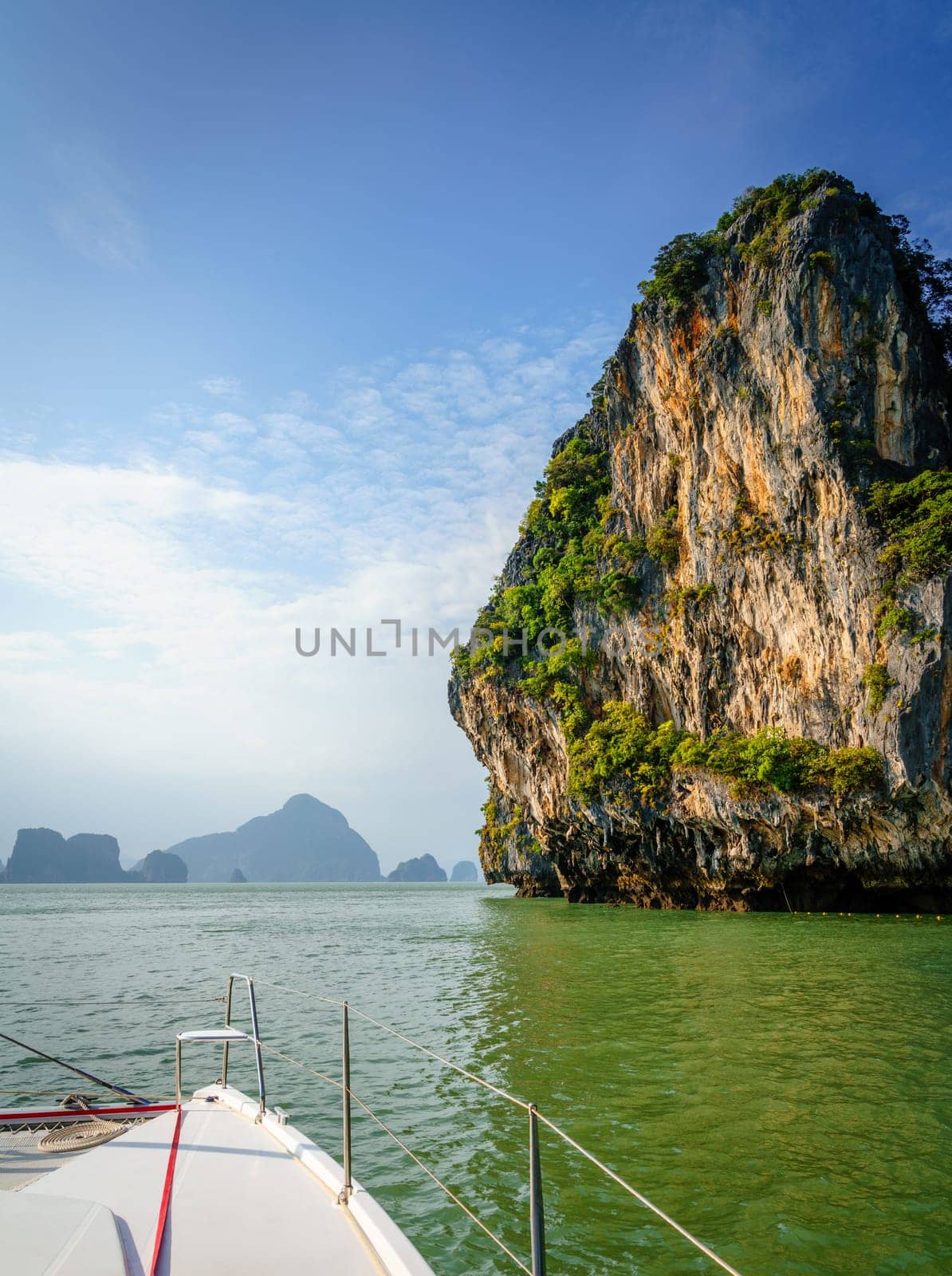 View of Koh Hong island in Andaman Sea with Phuket coastline on the horizon