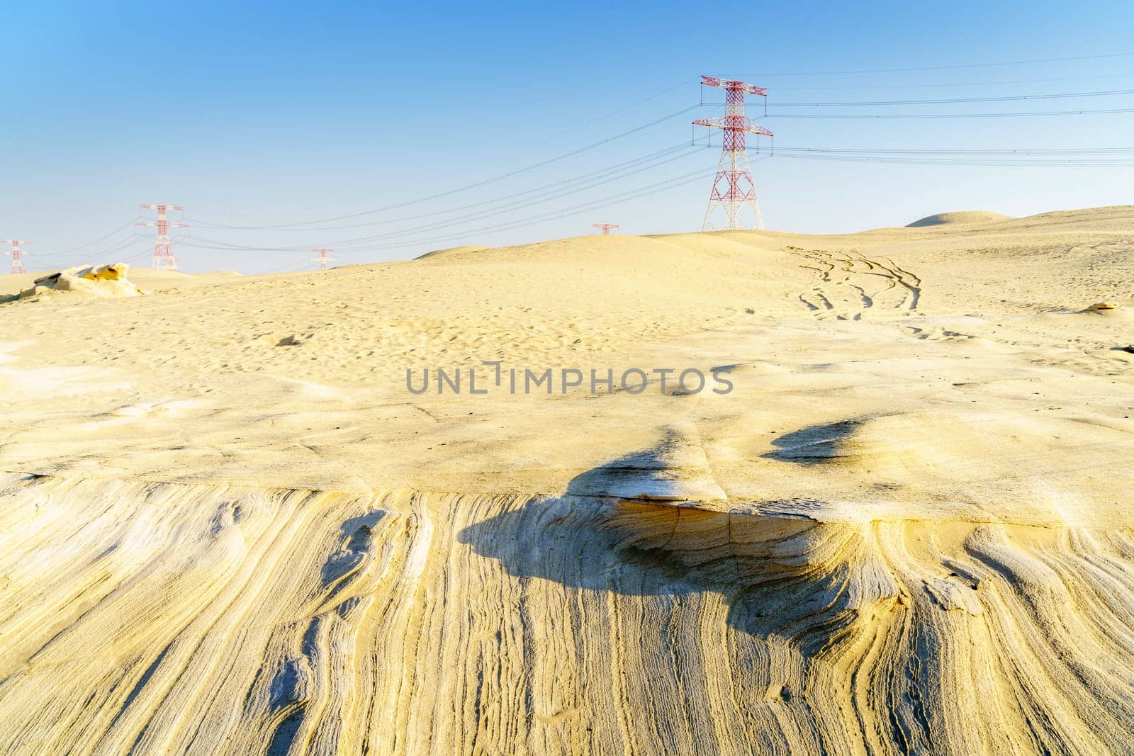 High voltage overhead transmission lines in Abu Dhabi desert