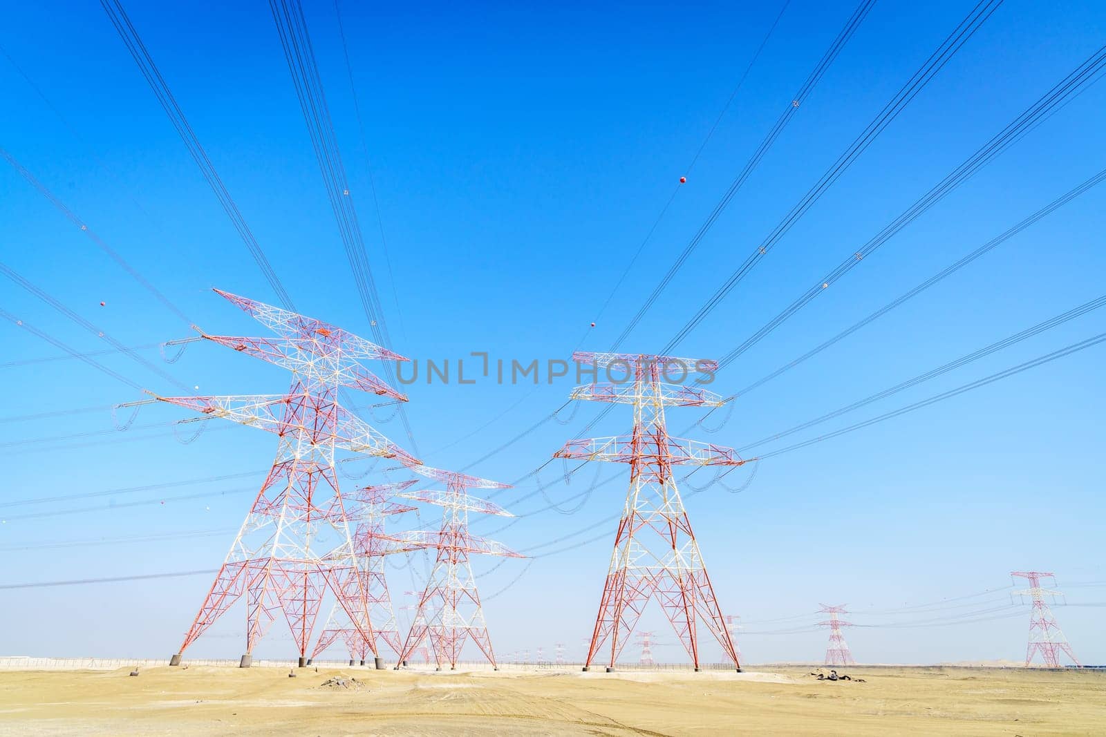 High voltage overhead transmission lines in Abu Dhabi desert