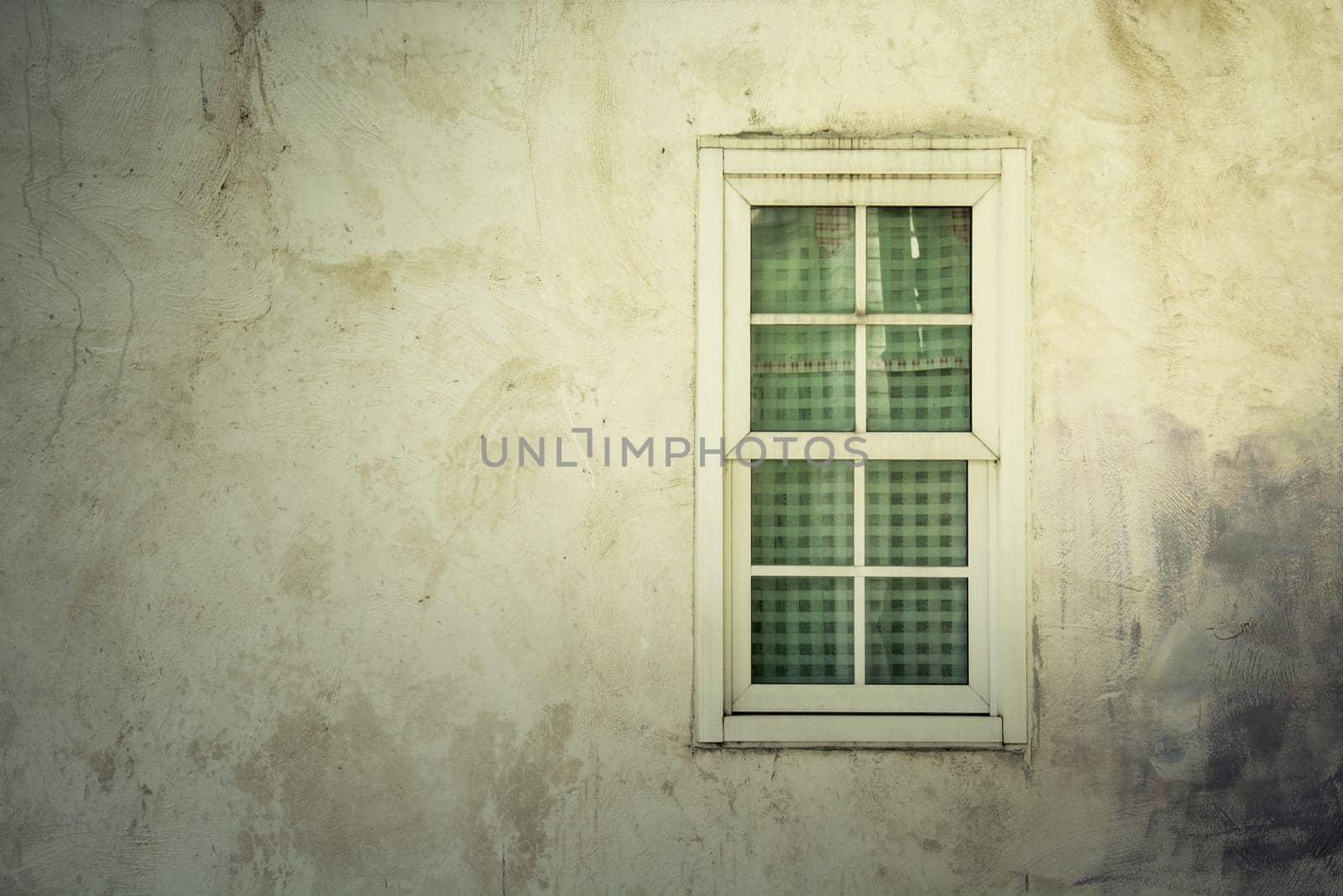 light on Vintage window on nice color cement wall can be used for background
