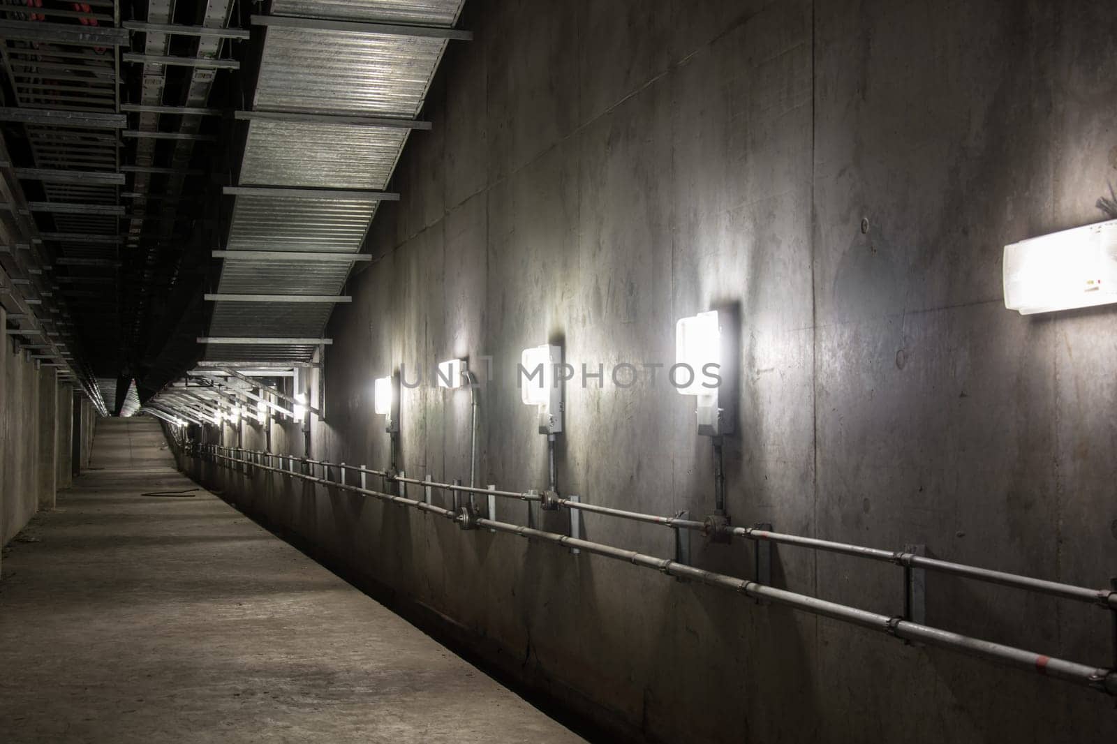 Empty industrial garage room interior with concrete floor and wall background