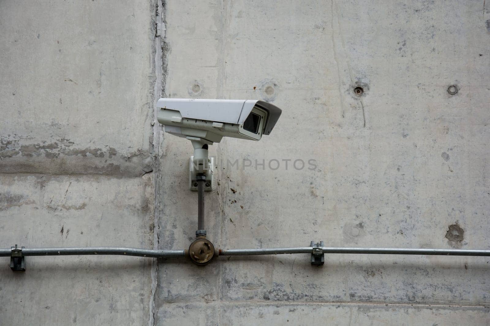 CCTV camera or surveillance operating with electric door in back