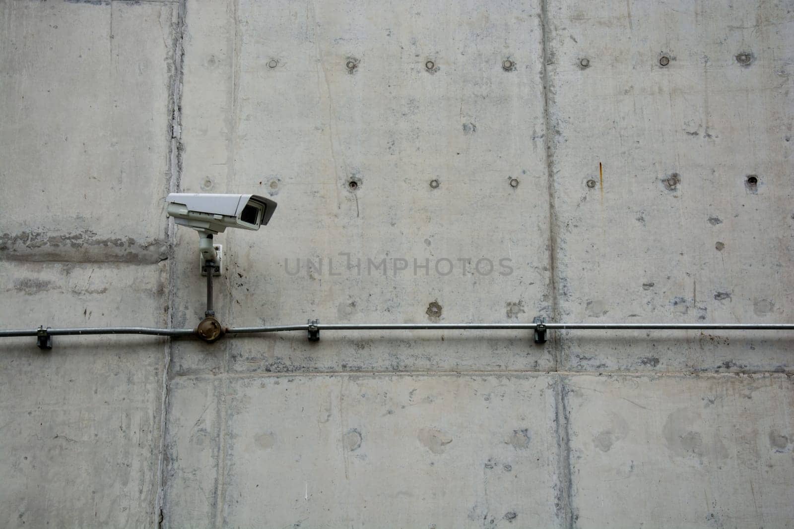 CCTV camera or surveillance operating with electric door in back