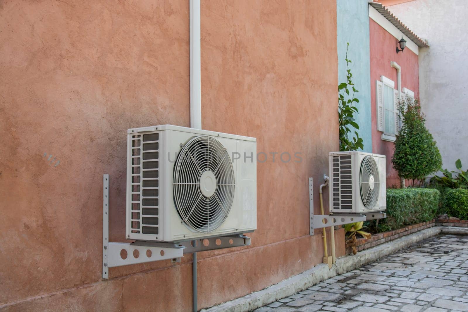 air compressor on the vintage brick wall