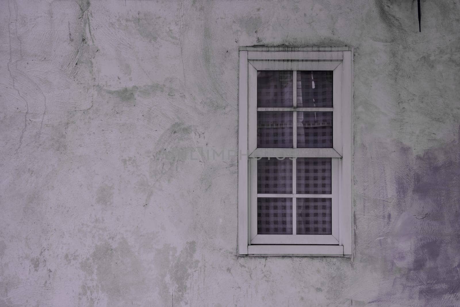 Vintage window on nice color cement wall can be used for background