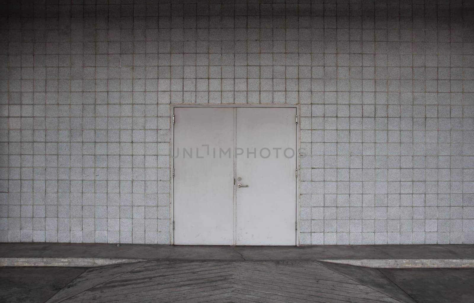 steel door and concrete surrounding.