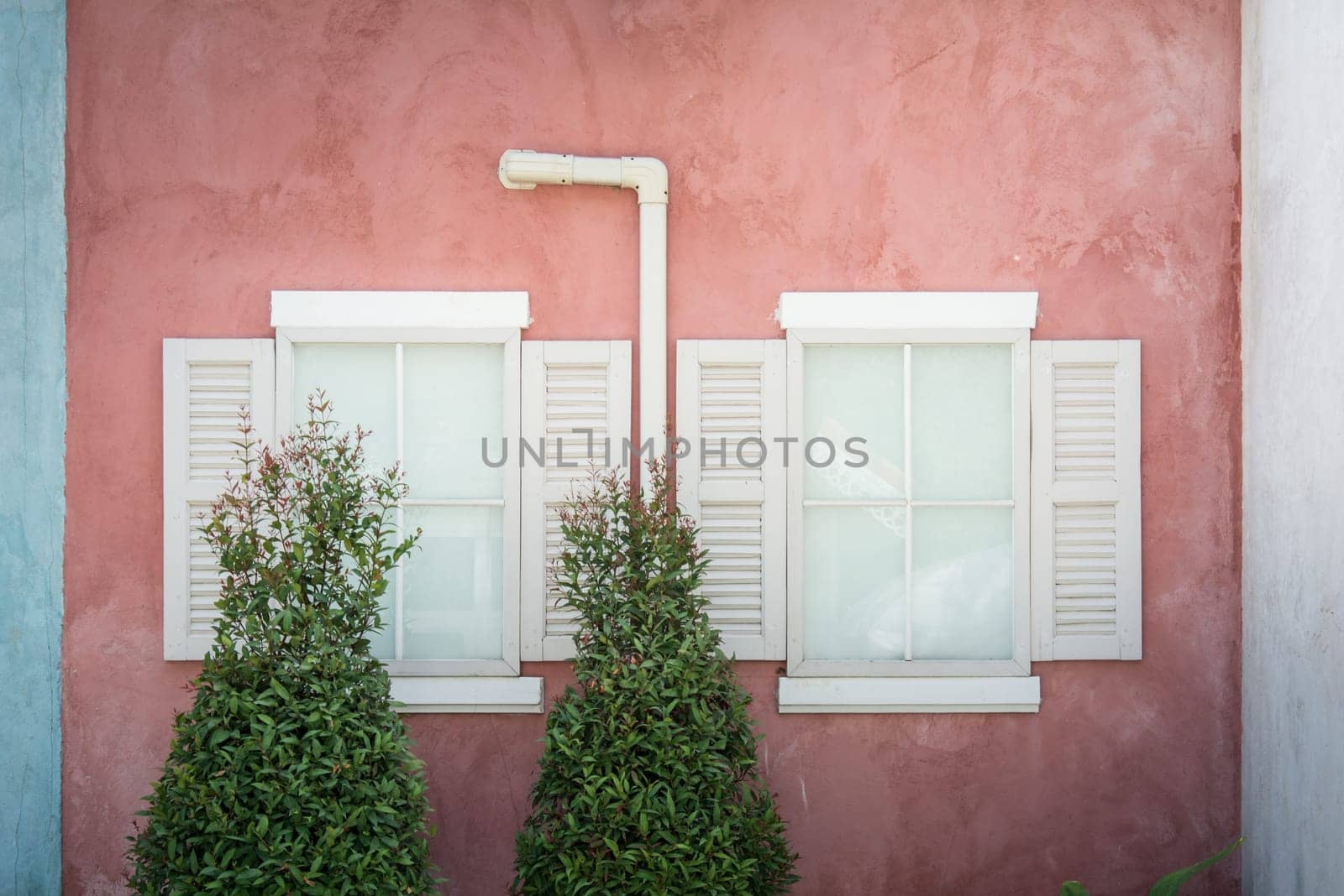 light on Vintage window on nice color cement wall can be used for background