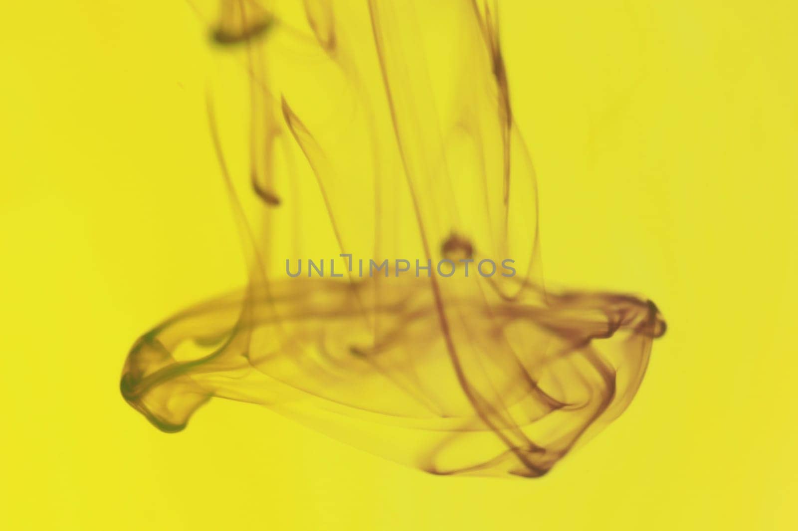 Liquid Drop Fantasy Art. Ink Drip in Water. Abstract Background.
