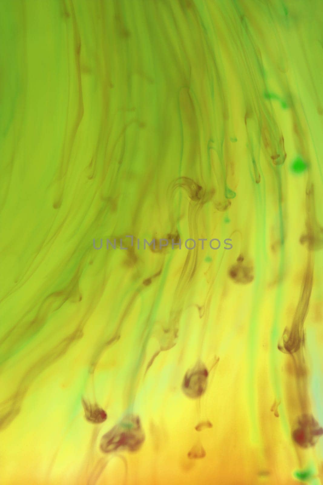 Falling Colored Ink Drops Dynamic Motion in Water. Soft Ambient Background.