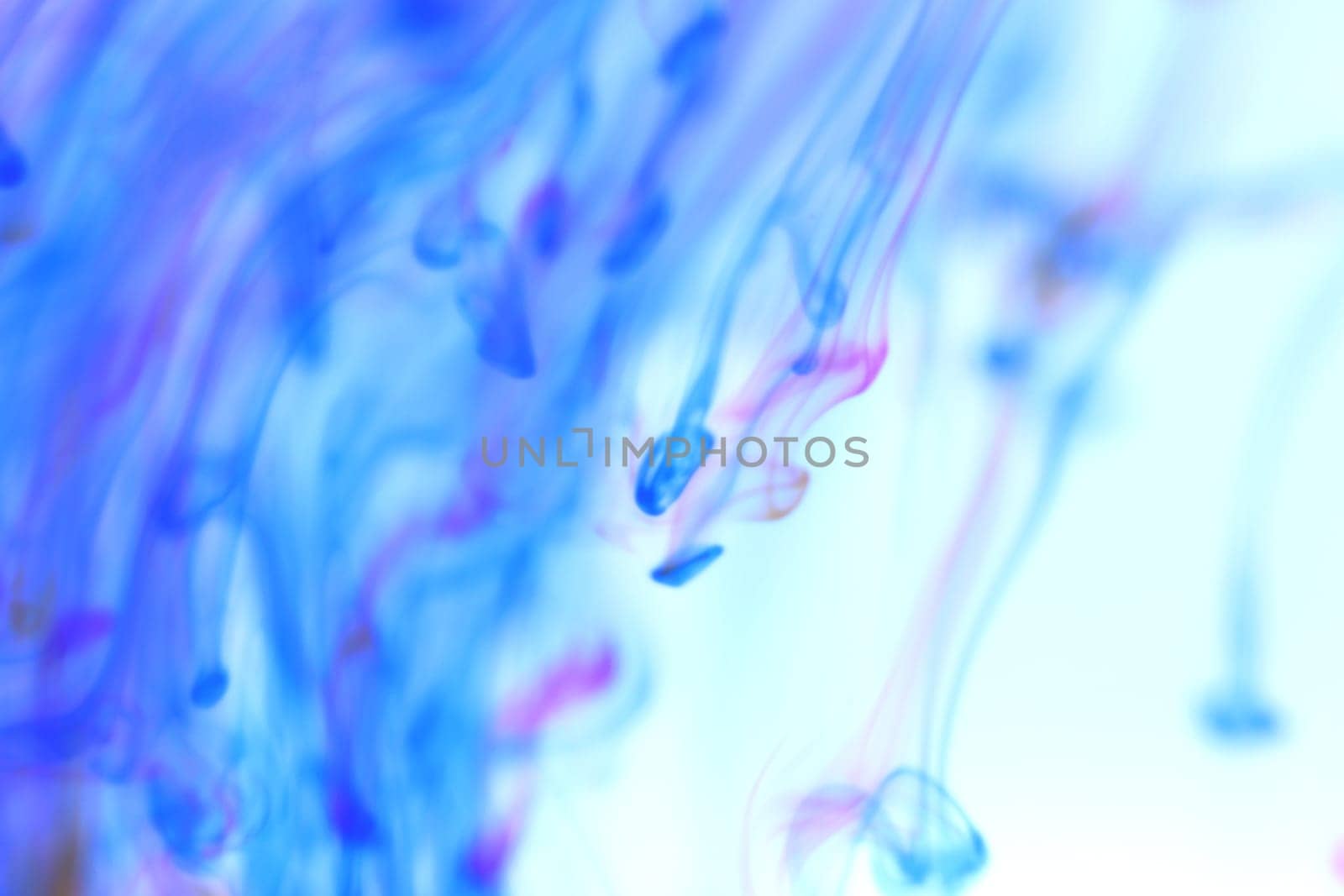 Falling Colored Ink Mystic Dynamic Motion in Water. Ambient Soft Background.