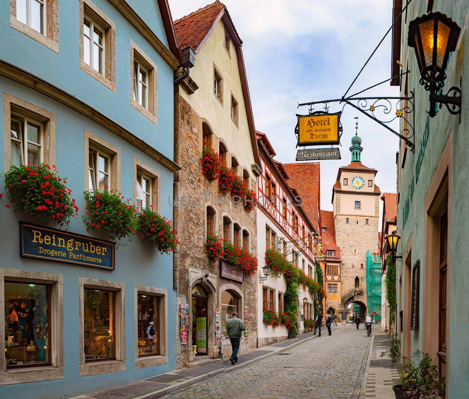 Rothenburg Ob Der Tauber, Germany - SEPTEMBER 24, 2014: View on city street with tower. Bavaria, Germany, Europe