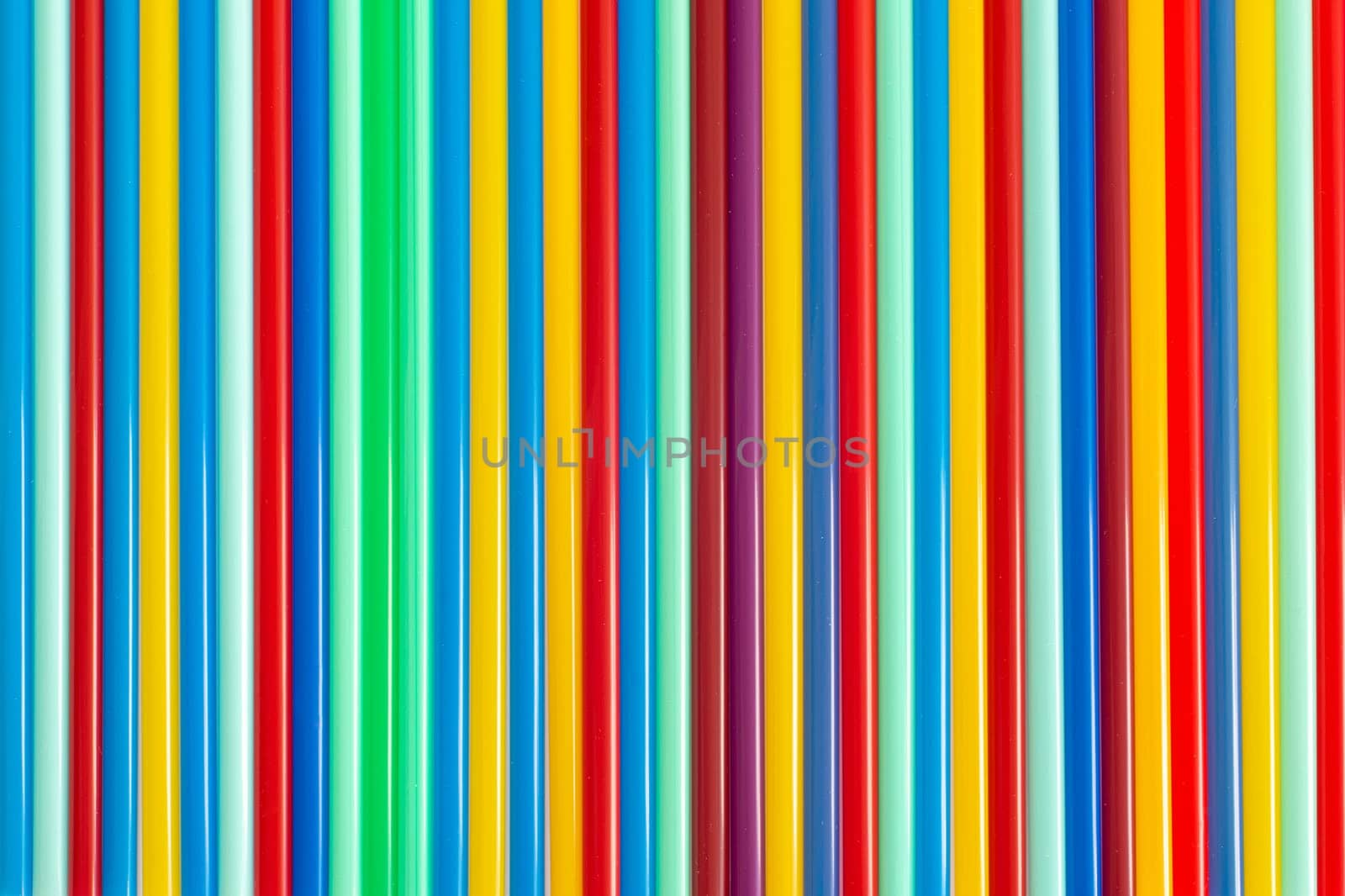 Colorful background of straws for drinks and cocktail