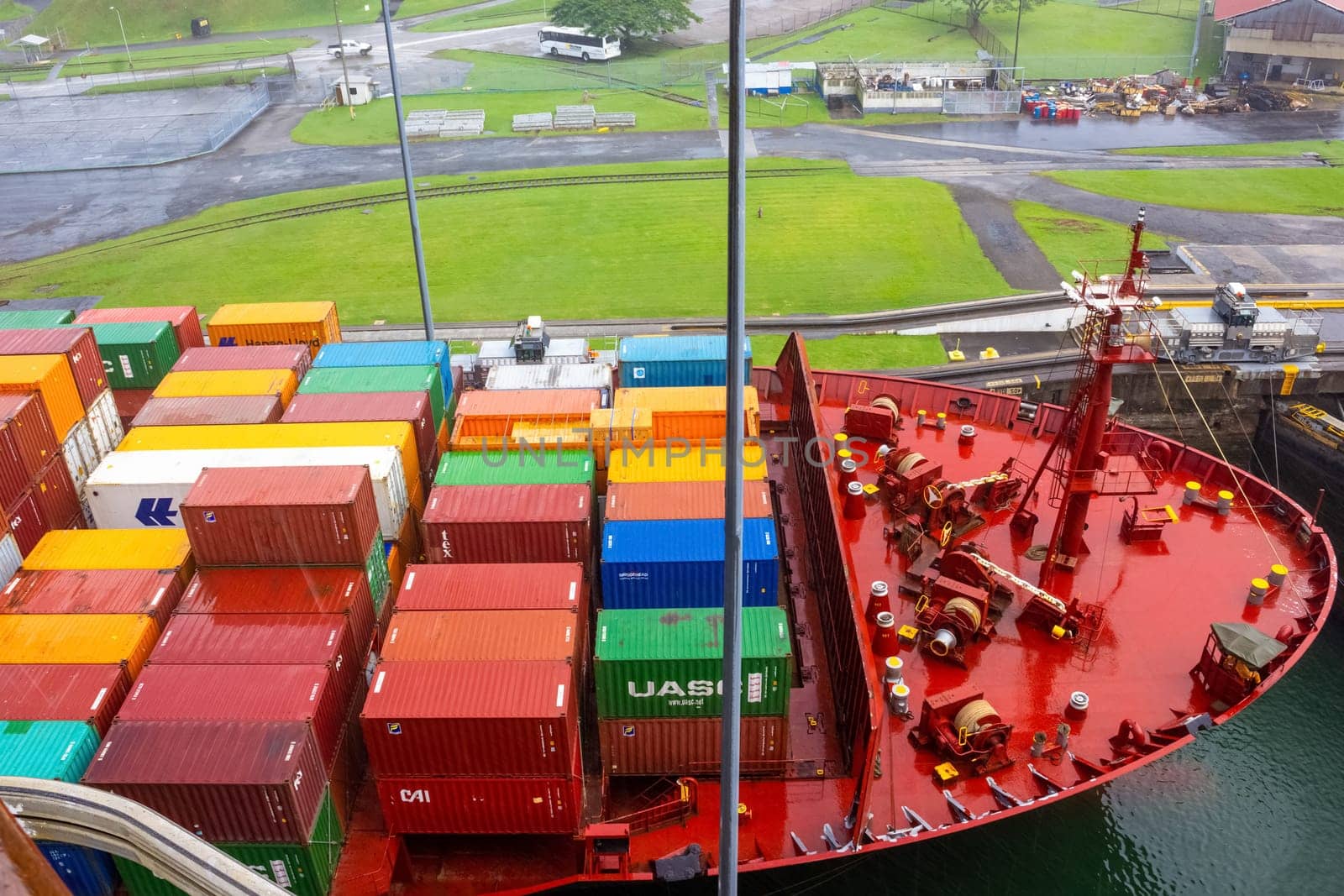 Panama Canal, Panama - December 7, 2019: A cargo ship entering the Miraflores Locks in the Panama Canal, in Panama