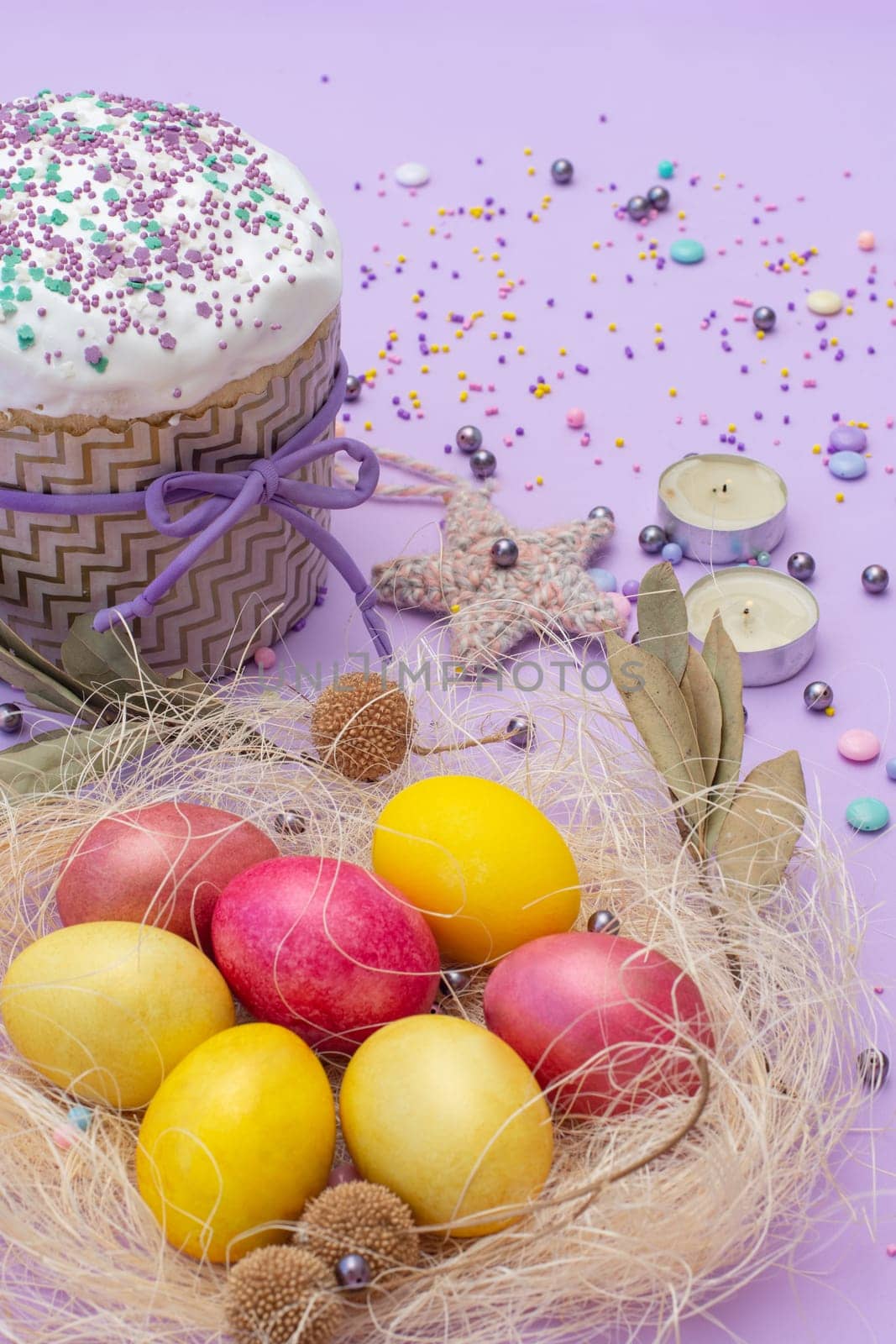 vertical photo of Easter attributes in yellow-pink tones