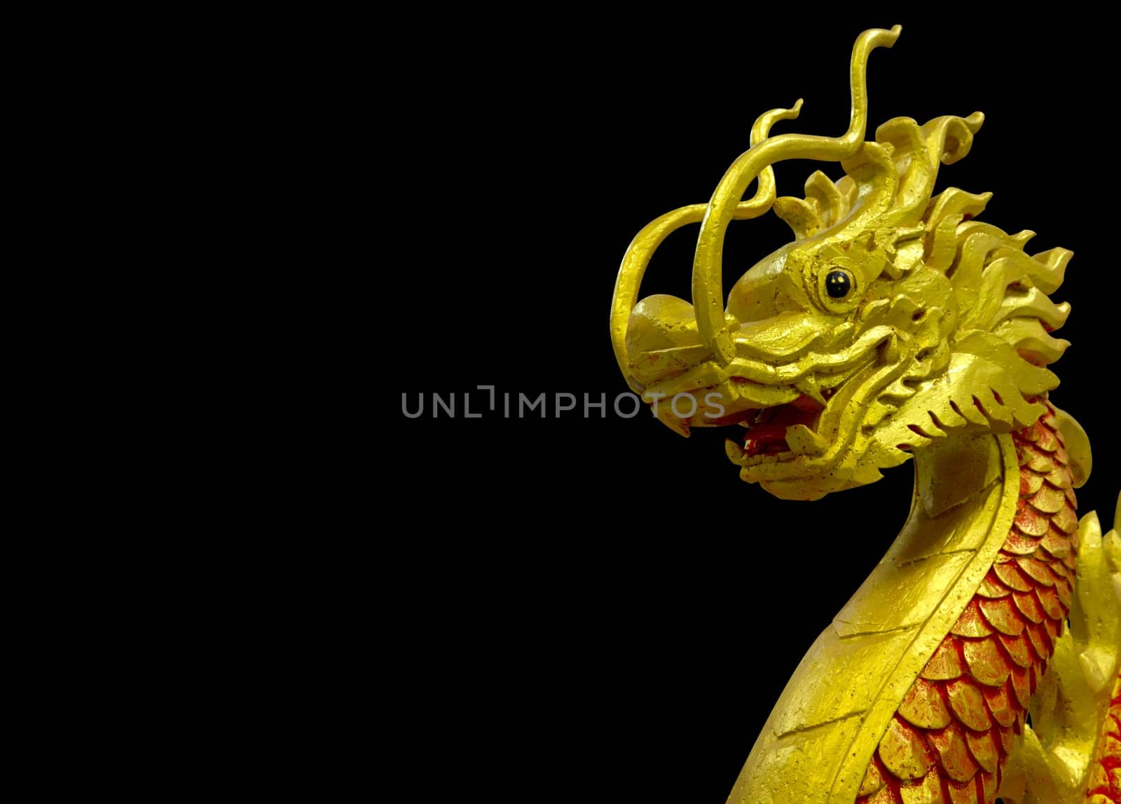 golden and red Chinese dragon on black background
