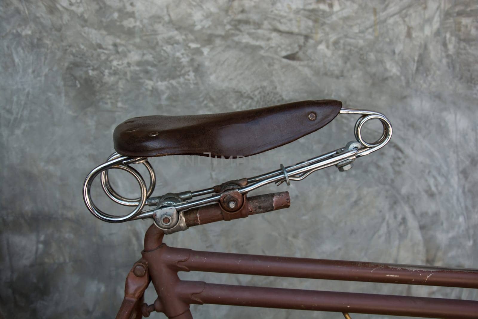 vintage leather bike saddle with metal spring