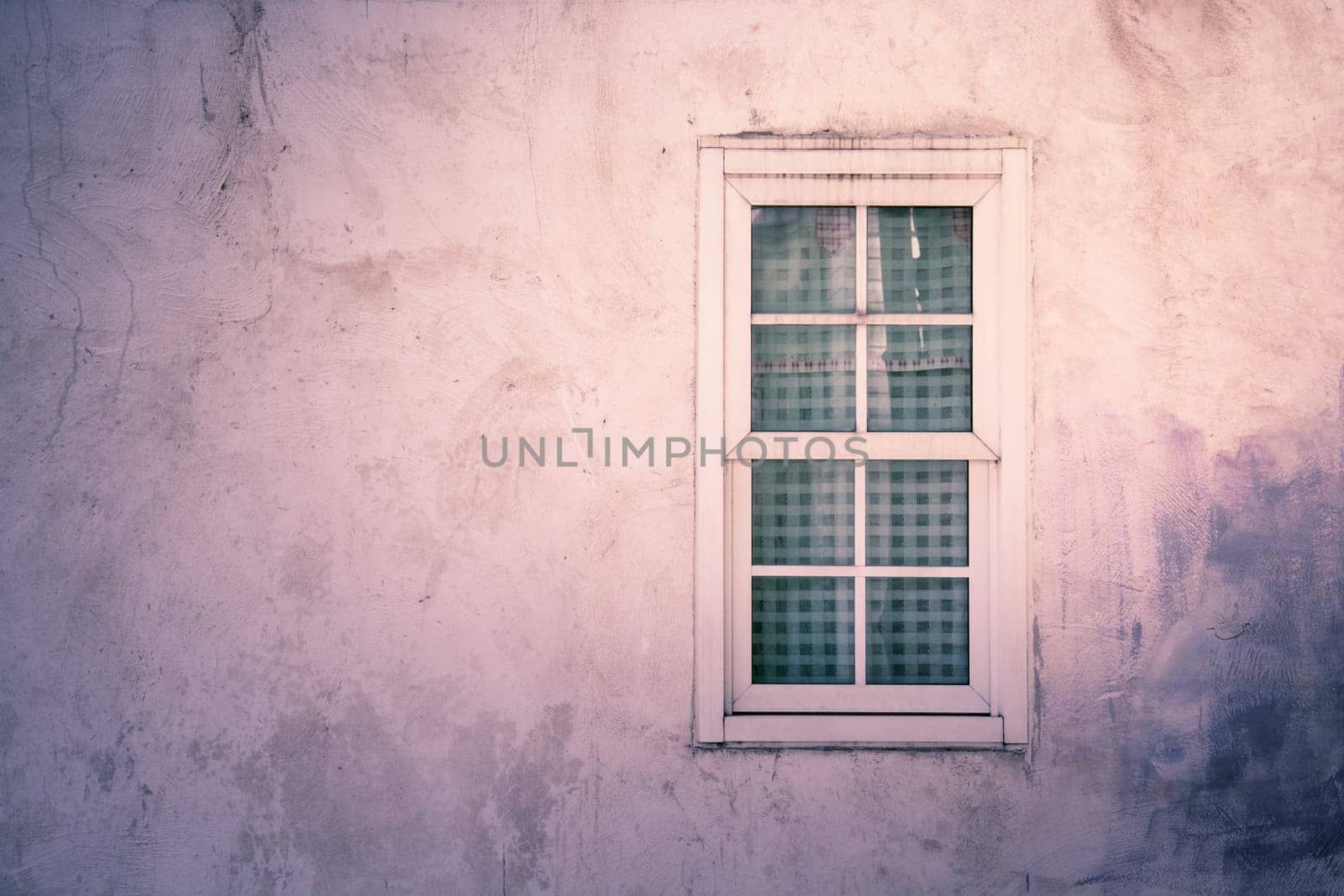 light on Vintage window on nice color cement wall can be used for background