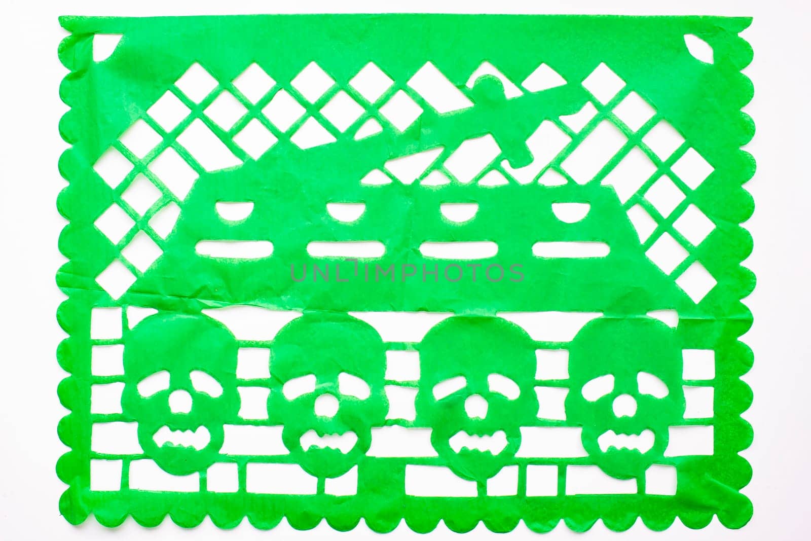 Day of the Dead, Papel Picado. Green Real traditional Mexican paper cutting flag. Isolated on white background.