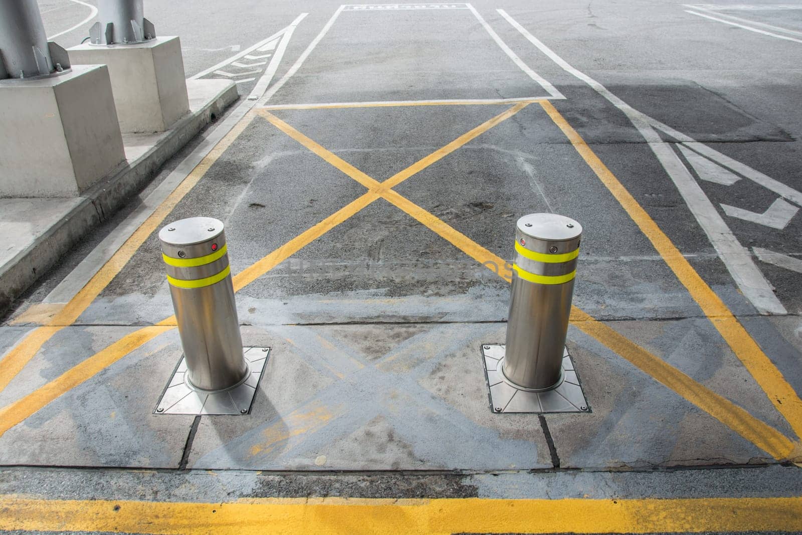 bollards with Security at the gate