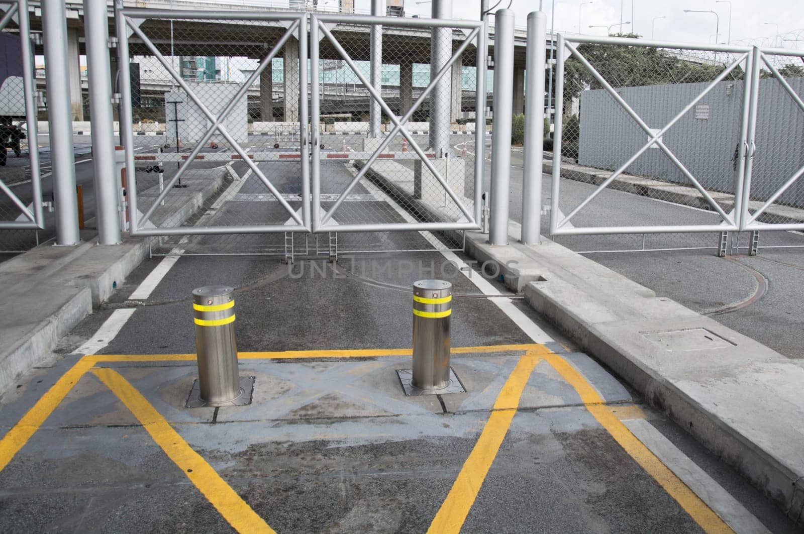 bollards with Security at the gate